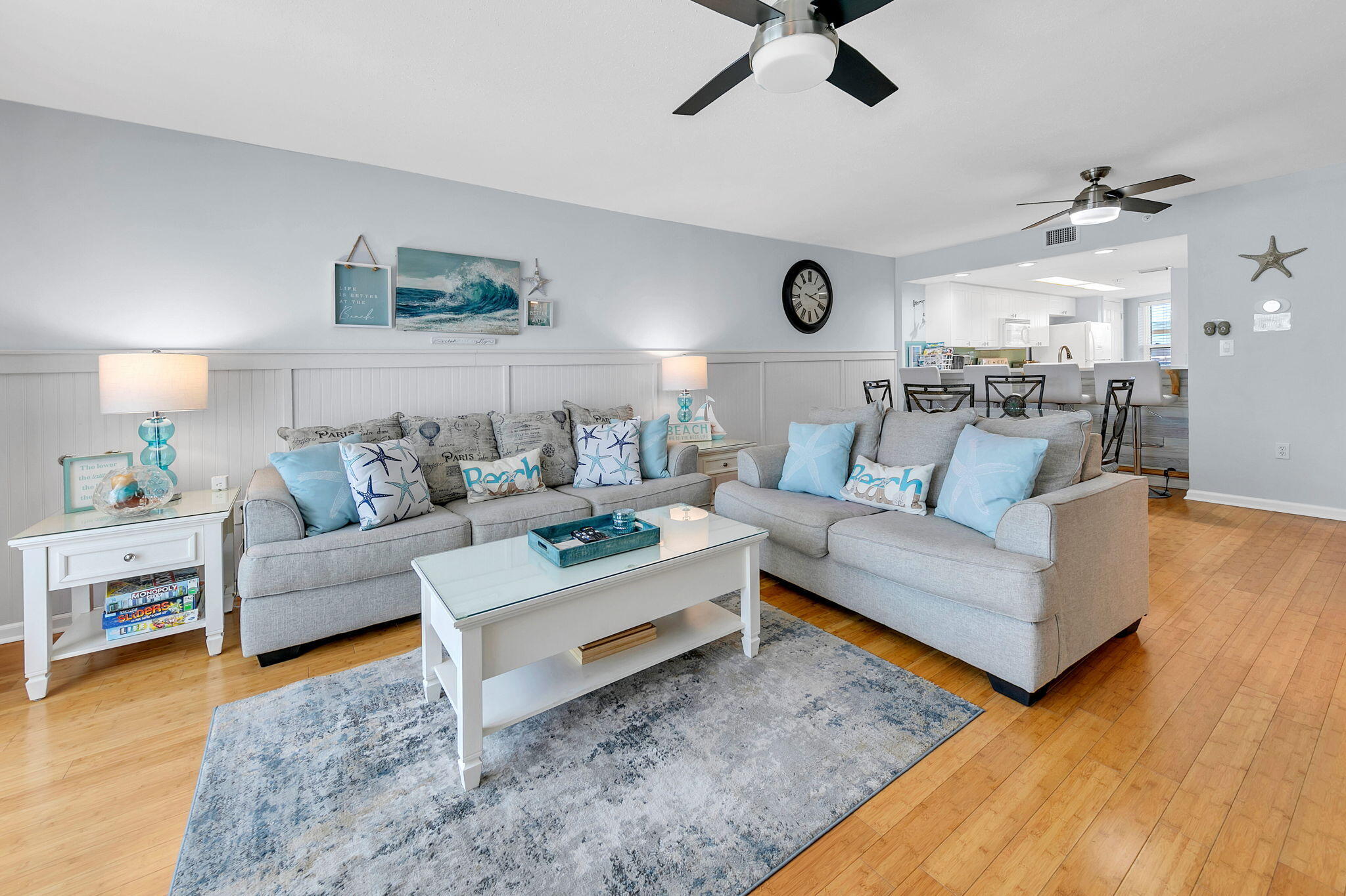 Experience the best of the Emerald Coast at this beautifully updated two-bedroom condo at SeaCrest on Okaloosa Island. Perfectly positioned on the second floor and closer to the beach, this inviting retreat combines comfort, style, and convenience in one of the building's most desirable locations. SeaCrest underwent a major exterior renovation in 2022, featuring all-new windows, sliding glass doors, and fresh exterior paint. Inside, the condo offers an effortlessly livable floor plan with sophisticated touches throughout, including bamboo flooring, an upgraded kitchen, updated furnishings and décor, a Google Nest thermostat, a new hot water heater installed in 2022, and a new refrigerator with an ice maker added in 2025. A standout feature of this property is the deeded covered parking spa ce -- a rare and highly sought-after benefit not available with all SeaCrest units. Residents and guests also enjoy an impressive array of amenities, including a sparkling indoor/outdoor swimming pool heated during the winter months, a fitness center, a BBQ area, ample parking, and, of course, the sugar-white sands and emerald waters just steps from your door.