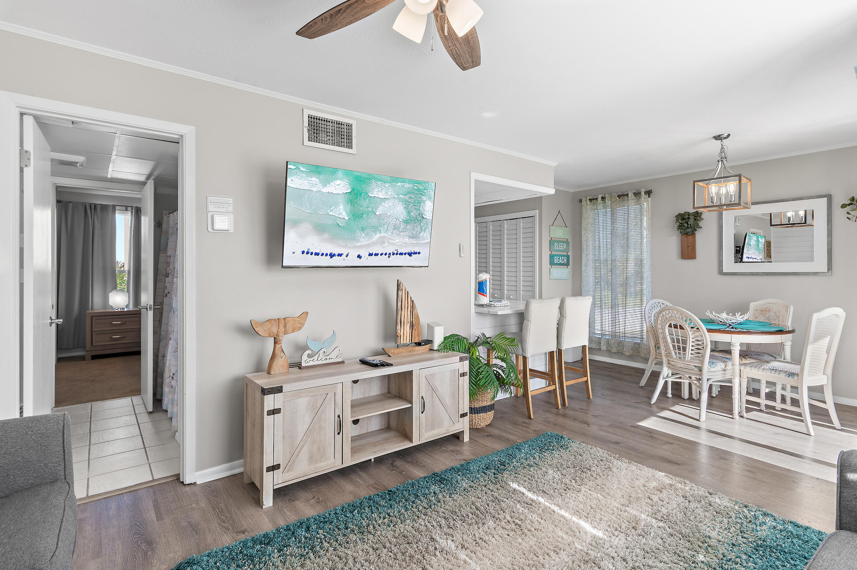 Here it is! One of the best values in all of Sandpiper Cove! This charming second-floor, one-bedroom condo has been freshly painted, thoughtfully maintained, and is priced to sell. Natural light pours through an abundance of windows, creating a bright and airy coastal retreat that feels like vacation every day. Step outside onto your private balcony and enjoy peaceful views of one of the community's beautifully manicured putting greens, surrounded by lush tropical landscaping. What truly sets this condo apart is its rare and highly desirable location within Destin--one of the few properties offering access to both the community's private deeded beach with restaurant/bar/bathrooms and the harbor for boating or water taxi rides to dinner, giving owners the best of both worlds. Spread across 43 acres of beautifully landscaped, gated resort grounds, Sandpiper Cove offers an unmatched coastal lifestyle. Residents and guests enjoy an incredible collection of amenities including five swimming pools (two heated), three hot tubs, tennis and pickleball courts, shuffleboard, bocce ball, horseshoes, a 9-hole par-3 golf course, marina access, BBQ areas, on-site dining, an event center, and private beach access. Whether you're spending the morning on the sugar-white sands, enjoying sunset views along the harbor, or connecting with neighbors at one of the many community