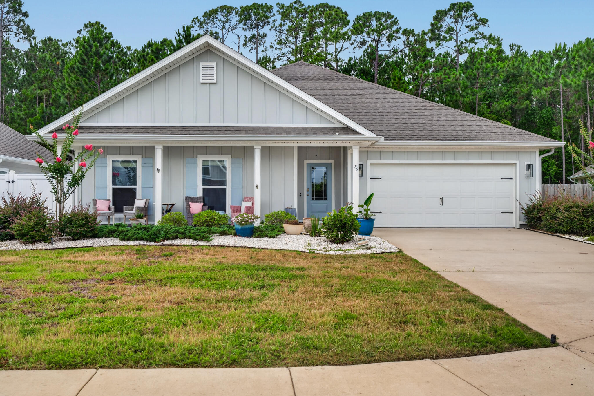 Nestled within the highly sought-after Treasure Cove community in Santa Rosa Beach, this beautifully maintained home on Krewe Circle offers an exceptional blend of comfort, style, and convenience. Situated on a private lot backing to a peaceful wooded area, the property provides a serene setting just minutes from the sugar-white sands and emerald-green waters of the Gulf Coast.

Designed with both everyday living and entertaining in mind, the open-concept floor plan features a spacious living area with a tray ceiling that flows seamlessly into the well-appointed kitchen. Highlights include Craftsman-style cabinetry, stainless steel appliances, quartz countertops, farm sink, a walk-in pantry, and abundant storage throughout. The LVP flooring and crown molding elevate this home.

The thoughtfully designed split-bedroom layout offers privacy for the primary suite, which is spacious enough to accommodate king-sized furnishings. The luxurious ensuite bath features a soaking tub, separate shower, linen closet, water closet, and large walk-in closet.

On the opposite side of the home, you'll find three additional bedrooms, a full bath, and a spacious laundry room. A powder room located just off the main living area adds extra functionality for guests.

Step outside to the expansive covered back porch, perfect for outdoor dining, entertaining, or simply relaxing while enjoying the peaceful wooded backdrop.

Treasure Trove has a deeded bayfront lot with a pier & dock for you to enjoy. For the golfing enthusiast, there are many public courses in the area.
For the fisherman there are many charter boats at the Destin Harbor.
The property is located one block from the bay and is on a cul-de-sac which is great for kids.
Ideally located near premier shopping, dining, entertainment, and all the amenities the area has to offer, this exceptional home combines coastal living with everyday comfort.