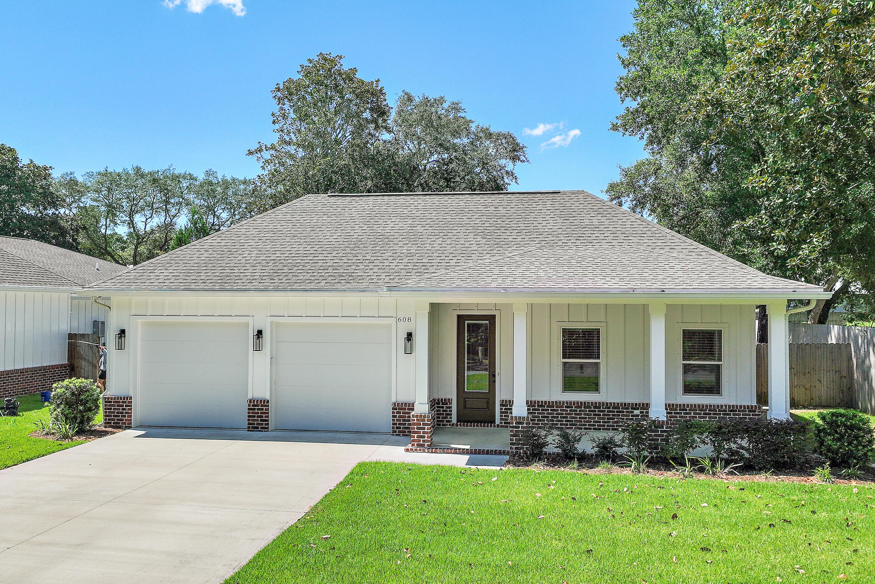 Built in 2024 and located in West Destin, this 4-bedroom, 3.5-bath home offers 2,184 square feet of thoughtfully designed living space with the convenience and low-maintenance appeal of newer construction.
The spacious, open-concept floor plan is designed for both everyday living and entertaining, with luxury vinyl plank flooring throughout and no carpet. The open and airy kitchen features granite countertops and stainless steel appliances and overlooks the living area and backyard, creating a natural gathering space for family and friends.
The spacious primary suite features a large walk-in closet and a well-appointed bath with double vanity, garden tub, separate walk-in shower, and private water closet. Generously sized guest bedrooms and baths provide plenty of flexibility for family, guests, or a home office. Additional features include window treatments and a two-car garage equipped with an EV charger.
Outside, the fully fenced backyard provides a private setting with plenty of room to relax, entertain, or create your own outdoor oasis.
Centrally located in West Destin, 608 Fifth Street puts you just minutes from Destin Elementary School, Joe's Bayou, Destin Harbor, area boat launches, shopping, dining, and the beaches of the Emerald Coast--all while maintaining the feel of an established residential neighborhood.
With newer construction, an open-concept four-bedroom floor plan, desirable interior finishes, a fenced backyard, two-car garage, and convenient Destin location, 608 Fifth Street offers an exceptional combination of space, comfort, and convenience.
Schedule your private showing today and see all that this West Destin home has to offer.