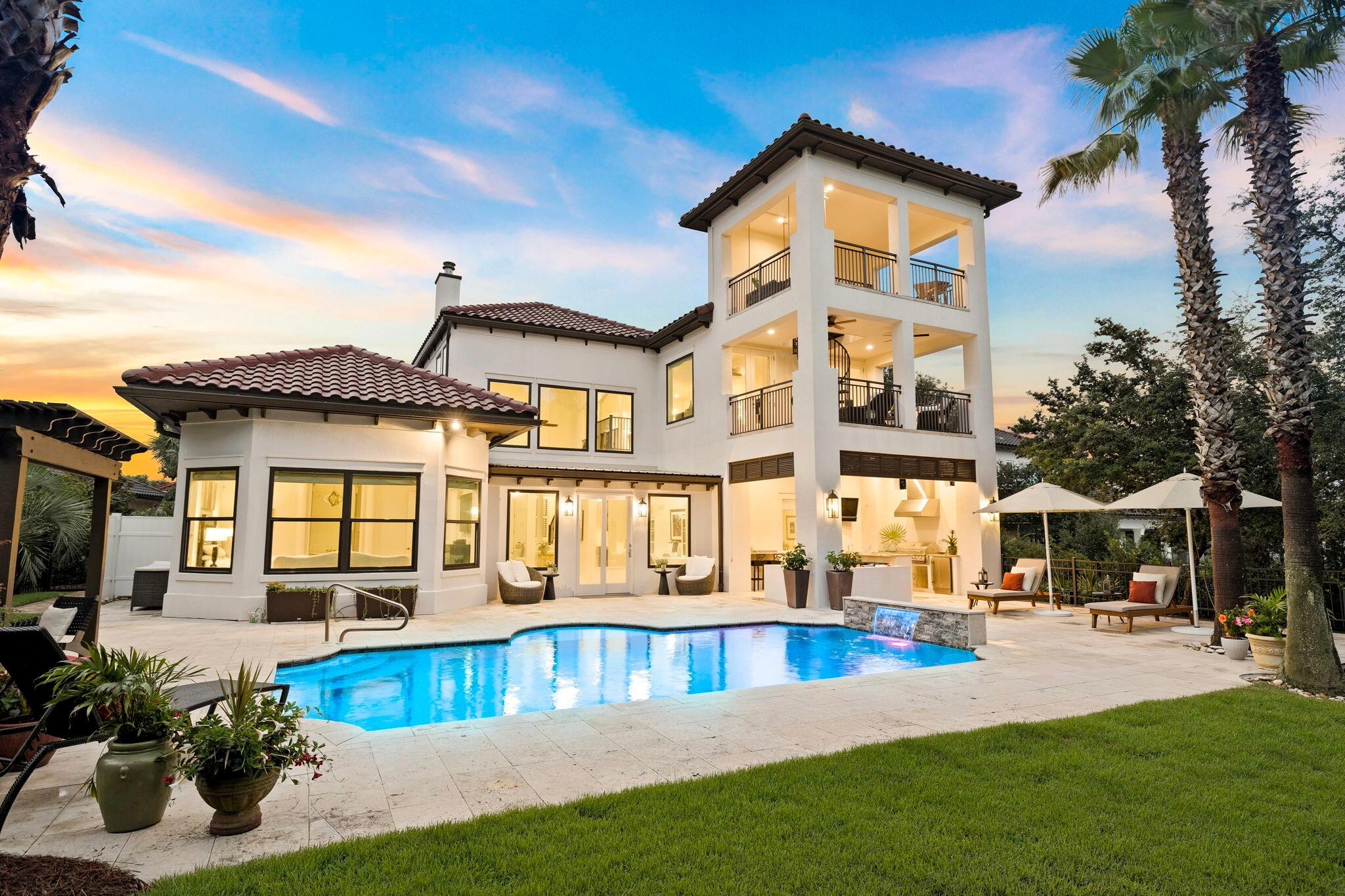 Refined coastal living awaits in the exclusive gated community of BellaMar at Gulf Place. This exceptional four-bedroom home sits on a private, 0.42-acre homesite and has been extensively updated, offering a truly turnkey opportunity with the look, feel, and functionality of a much newer residence. With all four bedrooms, including a spacious primary suite, located on the first floor, it is equally suited for full-time living, working remotely, or enjoying the ease of a luxury second home.

A sunroom that doubles as a quiet office overlooks the private backyard oasis. Beyond the windows, a sparkling pool, mature landscaping, and a generously sized homesite create the privacy and outdoor living that set this home apart. Inside, enjoy two fireplaces, multiple gathering spaces, and a show-stopping backlit translucent quartz bar. Recent improvements include a new roof, all new windows, modern finishes throughout, a whole-home generator, and UV germicidal lights installed in both HVAC systems for added peace of mind and cleaner indoor air. With its extensive improvements already complete, the next owner can simply move in with confidence.

Take in Gulf views from the private third-floor lookout, a unique vantage point made possible by the elevated homesite and the neighborhood's gently rolling topography. Then take the hidden walking path immediately east of the home to Gulf Place Town Center or stroll to the deeded beach access just across from BellaMar's gate by Vue on 30A. The fairways of Santa Rosa Golf & Beach Club border the west side of the neighborhood, complementing its natural beauty and relaxed coastal setting. Combined with the gated, rental-restricted setting and low HOA fees of just $430 per quarter, it's a lifestyle that's hard to match.

555 Sea Winds Drive presents a rare opportunity to enjoy privacy, generous outdoor space, and beautifully updated coastal living. Ask for the complete property details sheet highlighting the home's extensive improvements and features.