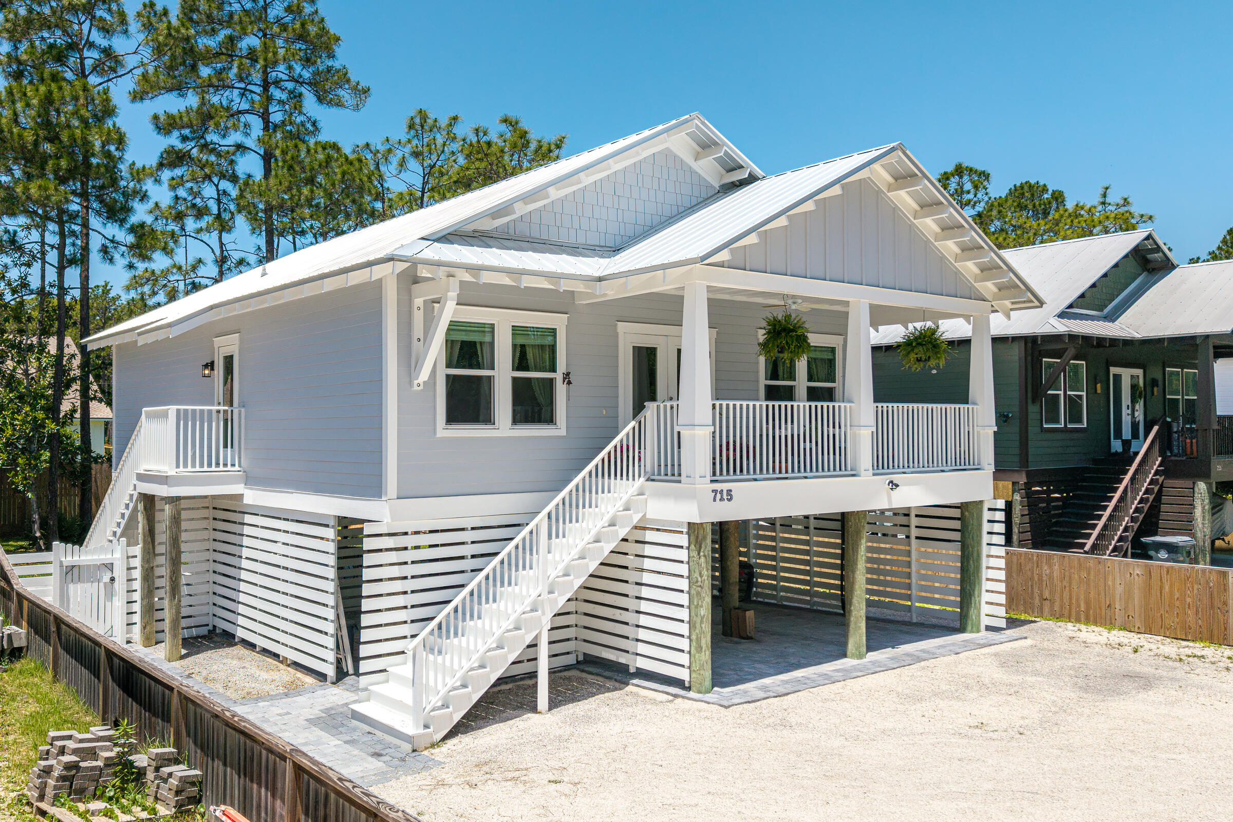 PRICE REDUCED! SELLING FULLY FURNISHED!! NO HOA IN THE HEART OF SANTA ROSA BEACH - ONLY 10 MINUTES TO WORLD RENOWNED EMERALD COAST BEACHES AND SCENIC 30A!! 5 MINUTES TO PICTURESQUE HOGTOWN BAYOU PUBLIC BOAT LAUNCH! PERFECT FULL TIME RESIDENCE OR INVESTMENT PROPERTY - 100% TURN-KEY!!
This 3 bedroom 2 bathroom home was built in 2023 and has only had one owner - very clean and selling fully furnished and decorated!!! Great investment opportunity, lucrative income producing property whether through long term or short term rental. Bay Coastal home design, built up on piling foundation. Seller has had the following improvements completed: Hurricane wall installed around the entire lower level perimeter of the home creating ultimate privacy & protection; brick pavers installed underneath the entire footprint of the home creating a large covered entertaining area separated from the 4-car covered parking; brick paver pathways and fire pit area; privacy fence; lush sodded backyard; Bahama rock driveway; fresh paint throughout entire interior of home; Reverse Osmosis water filtration system w/ regular filter change service. The home features an open concept living/dining/kitchen space, LVP flooring throughout, and upgraded lighting fixtures. Relax on the large covered porch spanning the front, as well as a covered porch off the master suite overlooking the beautiful green space and fire pit area. Plenty of room to add a pool!! NO HOA, plenty of space to park your boat, and drive just 5 minutes to launch at beautiful Hogtown Bayou public boat launch!! Just a 10 minute drive to the white sand beaches of the Emerald Coast, with newly added public parking and tram service to public beach accesses across wildly popular 30A from the West End to Grayton Beach! Take your street legal golf cart from this home all the way down South County Road 393 to 30A to enjoy the finest shopping and dining, all the way to Grayton Beach, Seaside, Alys Beach and Rosemary Beach! Seller offers the opportunity to purchase the vacant lot next door for even more room to expand or build - see MLS ID 1005409!
Seller has a survey and elevation certificate they can provide, as well as the builder's specs and floor plan. Washer and Dryer convey, all furnishings convey, all TV's convey, all window treatments & artwork convey, all outdoor furniture BBQ grill, and Solo Stove to convey - truly TURN KEY READY! HVAC system inspected and serviced 04/2026! Call today for more information or to schedule a private tour of this fabulous opportunity!