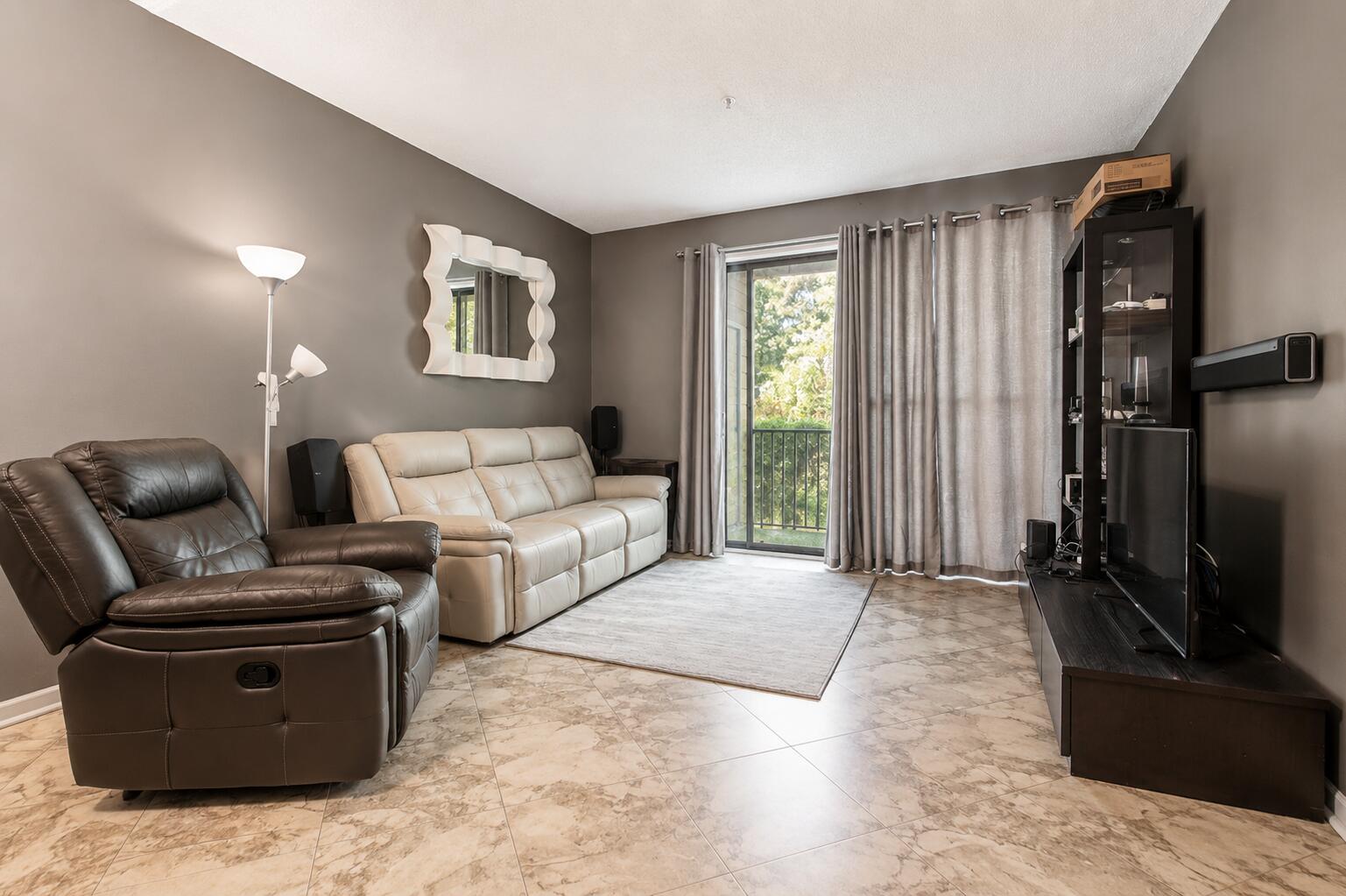 Highly sought after 2 bed 2 bath GROUND FLOOR UNIT. Tenant occupied on month to month lease. Tile floors in the main living area and carpet in the master bedroom. Pointe of View has a community pool and fitness center. Short walk to Grand Boulevard, Publix, Sacred Heart Hospital, and Boulevard 10 movie theater. Just minutes to the beaches of the Gulf of Mexico. Short term Rentals Allowed. Buyer to verify all info and measurements. Some photos have been digitally altered.