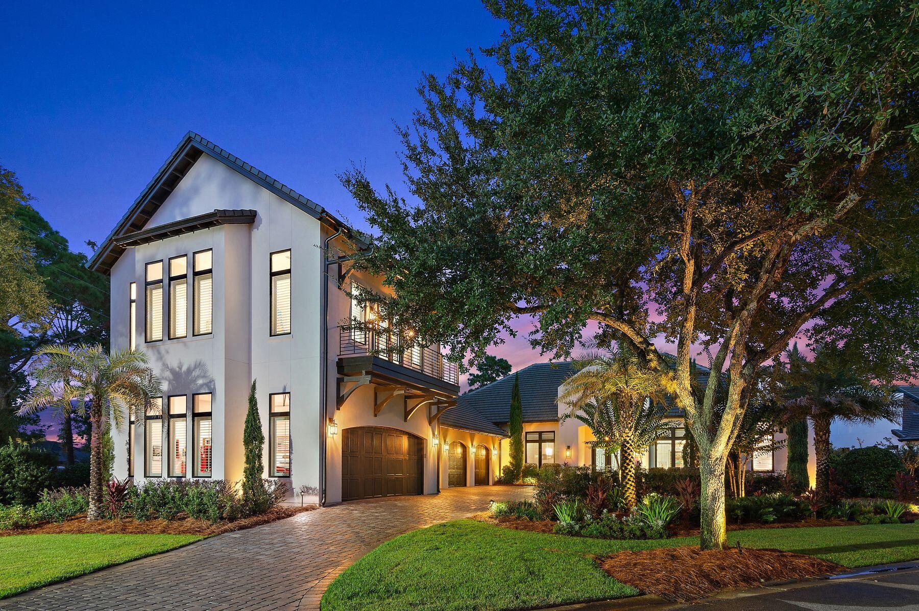 This remarkable Burnt Pine residence offers an unparalleled lifestyle of space, luxury, and comfort. Designed for both entertaining and everyday living, the home is distinguished as the only property in the community with a five-car garage, complete with air conditioning and custom flooring — ideal for a car enthusiast or collector.

From the moment you step inside, your eyes are drawn directly to the sparkling pool and sundeck framed by sliding glass doors, creating an immediate sense of arrival into your own private oasis. The main living area features soaring ceilings, new tile flooring, and a fireplace that anchors the room with warmth and elegance. The gourmet kitchen is equipped with a Wolf stove, Sub-Zero refrigerator, Bosch dishwasher, wine fridge, wet bar, and new