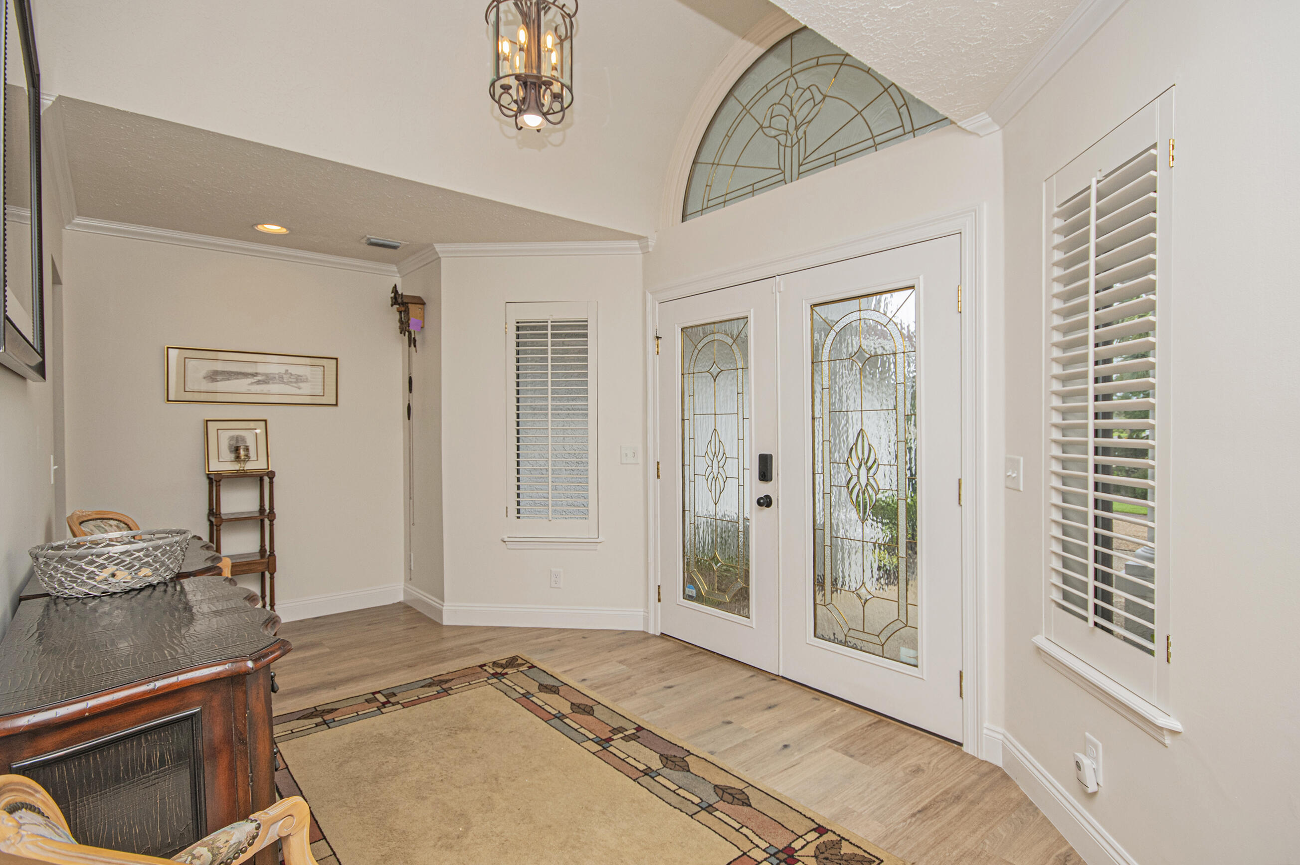 Welcome home to this beautifully updated ranch-style residence offering the perfect blend of comfort, space, and functionality. Renovated in 2022, this open and spacious home features 4 generously sized bedrooms and 3.5 baths, including a private mother-in-law suite with its own full bathroom--ideal for guests or multi-generational living. The heart of the home is the updated kitchen, designed for both everyday living and entertaining, with abundant storage and seamless flow into the breakfast room and living areas. A separate dining room provides the perfect setting for family gatherings and special occasions. Cozy up by the gas fireplace or step outside to the screened porch overlooking your backyard oasis. The fully fenced yard features an inground pool, charming treehouse, and plenty of room for recreation and relaxation. Additional highlights include a whole-house generator, newer well, ample storage throughout, and thoughtfully designed living spaces that make this home as practical as it is inviting. Whether you're hosting poolside gatherings or enjoying a quiet evening on the porch, this move-in-ready property offers something for everyone. Don't miss the opportunity to make this exceptional home yours!