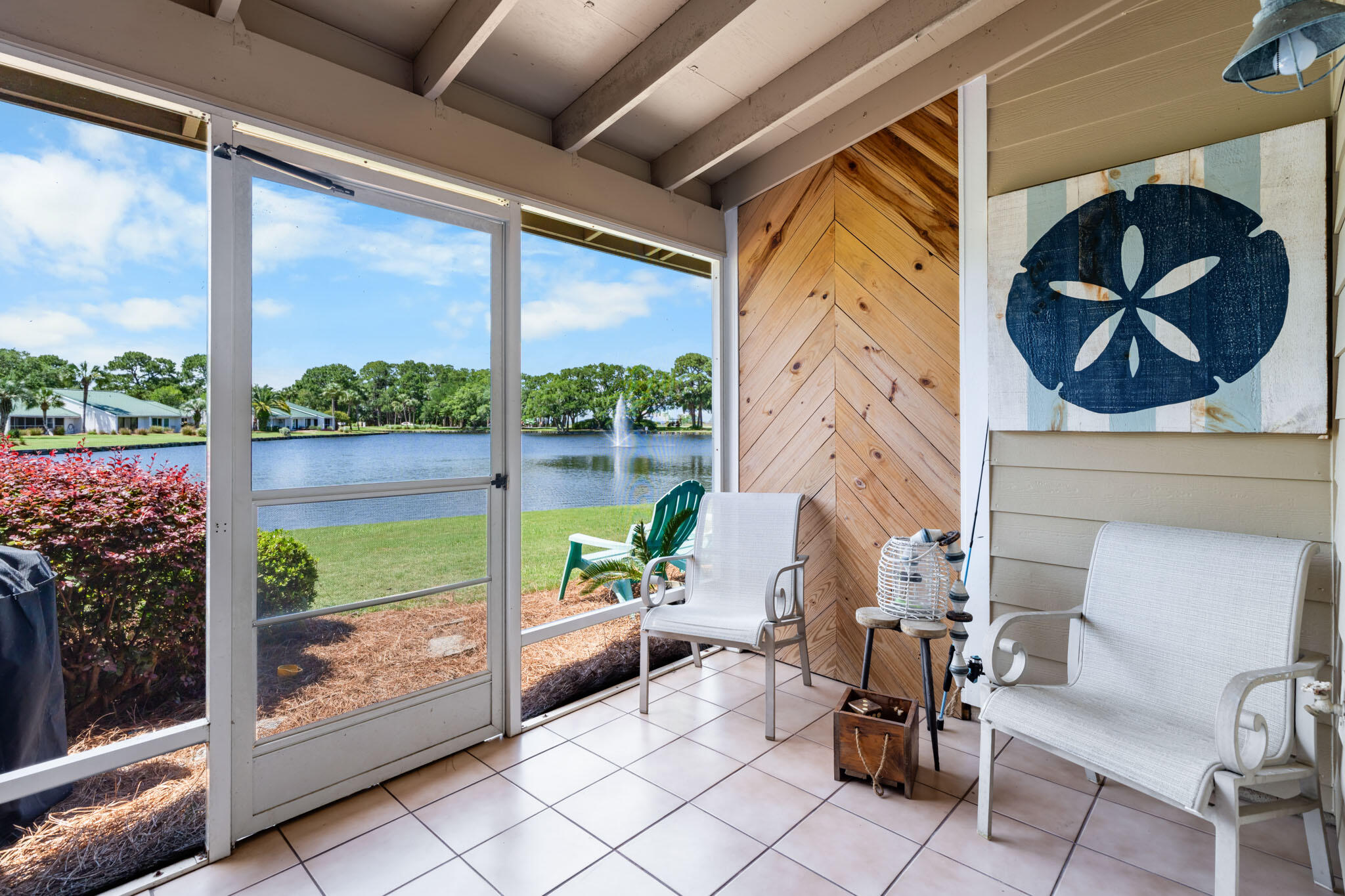 Stunning town home at Bayou Village! Located on the North side of  Sandestin Resort.  This impressive town home is perfectly situated lakeside with picturesque fountain views.  Panoramic views of the Choctawhatchee Bay and the marina can be enjoyed from the living area or master bedroom. The beach is just a short ride away by golf cart or tram.  You may also take the golf cart to the Village of Baytowne Wharf where you will find restaurants, boutique shops, and entertainment. with 2 Full bedrooms and 3 Full bathrooms, this unit can accommodate your guests or your family with ease.