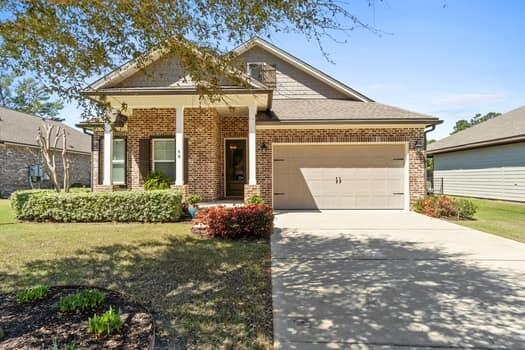 Experience serenity in this like new, lakefront Randy Wise home w/ top-of-the-line finishes! The views and cul-se-sac location provide a private oasis within Hammock Bay. The open, gourmet kitchen features pristine white cabinets, custom quartz counters, upgraded appliances and a sprawling island perfect for entertaining. Upgraded vinyl plank flooring throughout. Retreat to a stunning mbdr that easily accommodates oversize furniture and is complete with a luxurious en-suite bath. The flex room w/ French doors can be used as an office or bdr. Enjoy an oversized living room with access to a covered/screened in back porch w gas access for a grill. The porch opens to an additional 13X22 open air patio.  Fantastic views of the large, fenced in back yard and lake. Hammock Bay amenities included!