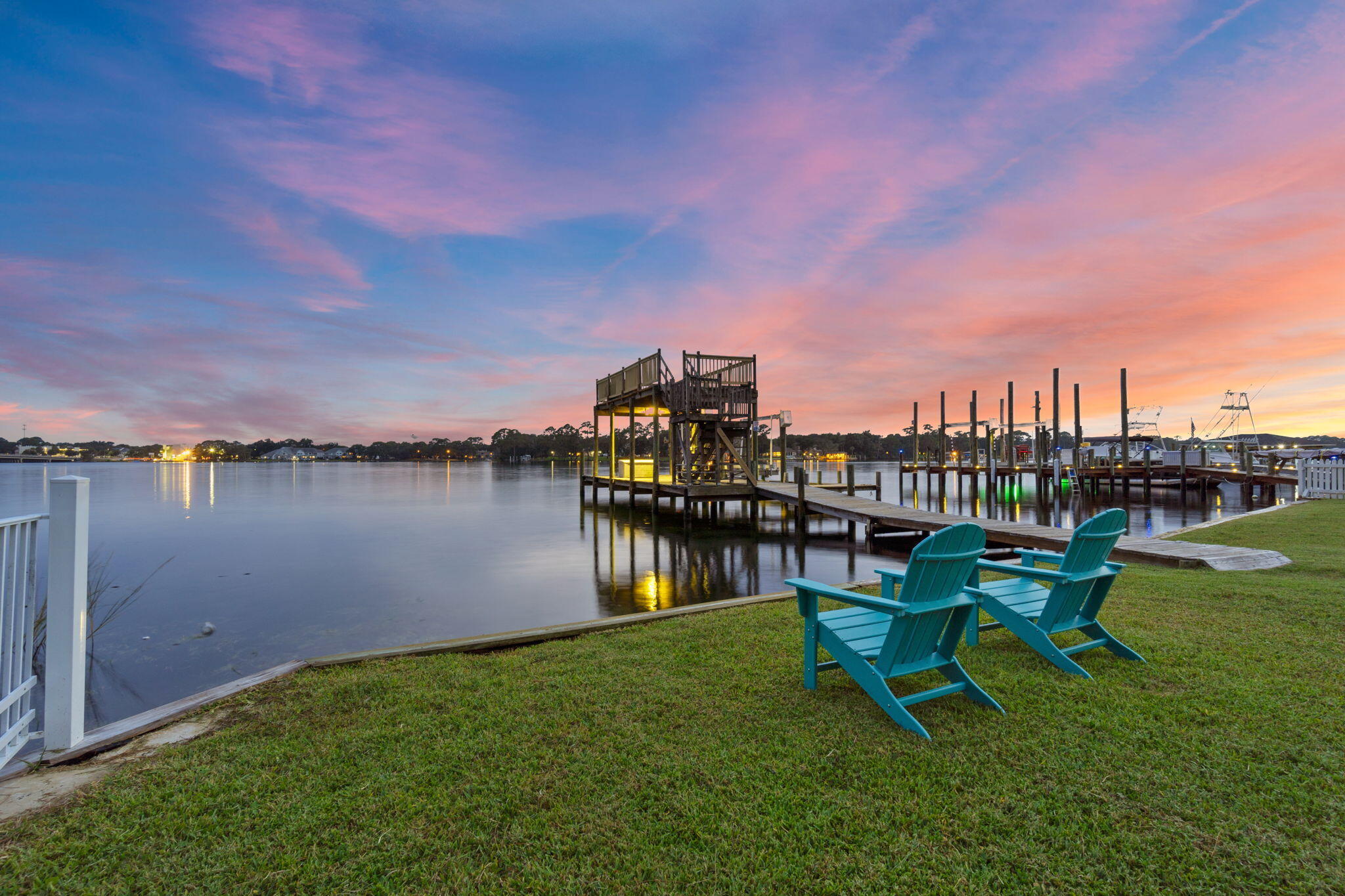 Rare 98 ft of waterfront property with a 2 story dock, boat lift w/ electric & water, and multiple private lockout suites. It's flexible layout offers multiple possibilities. Perfect for a full-time coastal retreat, secondary home, Airbnb or multi generational property. No HOA and short term rental is allowed. Currently operating as a thriving turnkey waterfront rental property with proven success at its start in 2024 and going strong to the present.
Enjoy stunning views, beautiful sunsets, expansive outdoor living space, a large balcony, and direct water access.
OTHER FEATURES: 
LIGHT & BRIGHT GREAT ROOM, GRANITE COUNTER TOPS, LARGE KITCHEN ISLAND, COMMERCIAL REFRIGERATOR, 2 LAUNDRY AREAS, GAME ROOM, 3 LOCK OUT SUITES W/ KITCHENETTES, AMPLE PARKING, WHOLE HOME GENERATOR, 2 STORAGE SHEDS, 2020 AC UNIT, FLOOD GATES, EFFECTIVE YEAR BUILT 2000

2024 GROSS   $160, 902
2025 GROSS $145, 328