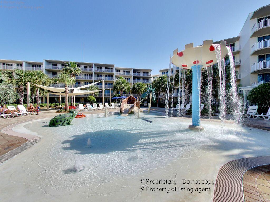 Waterscape A227 is a ground level condo steps from the magnificent pool deck for which Waterscape is renowned. No elevators needed, simply step outside and the fun is just moments away! Enjoy morning sunshine and cool evening breezes on the private patio, the perfect spot for coffee, cocktails, and coastal relaxation.

Waterscape is one of the most popular beachfront resorts in the Destin and Fort Walton Beach area, and the incredible amenities are a big reason why. The spectacular pool deck features multiple pools, waterfalls, a lazy river, splash pad with waterslide, a lily pad obstacle course, hot tubs, and plenty of space to relax in the Florida sunshine. Poolside grilling areas make family cookouts easy, while direct beach access puts the sugar white sand and emerald waters of the Gulf just steps away.

A227 has a strong rental history and enjoys year round appeal. Whether you are looking for an investment property, a personal beach retreat, or the best of both worlds, this condo delivers an exceptional combination of location, amenities and rental potential at one of the Emerald Coast's most sought after resorts.