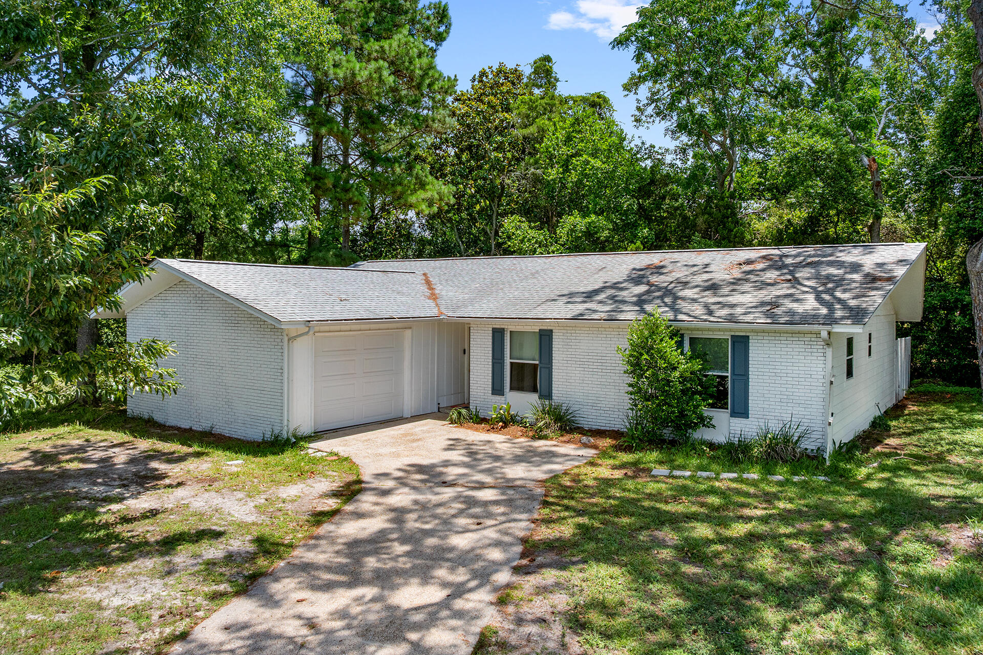 Welcome to a wonderful starter or next-home with 3 bedrooms, 2 bathrooms and backyard space to get creative, this home offers an incredible opportunity for both investors and families seeking a beachside getaway or staycation type lifestyle. Renovation done in 2018, included new flooring throughout the home, new appliances, and a new hot water heater (2018) and HVAC (2020). 

For those looking to invest, this property's prime location is less than a mile from the beach and the infamous Pier Park (public access 56), ever-growing and drawing events like Gulf Coast Jam, Florida Jeep Jam, and Thunder Beach along with holiday festivities like July 4th Fireworks (from Russell-Fields Pier) and Musical Acts for all to enjoy via Aaron Bessant Park's Summer Series!

The lakefront setting make it an irresistible choice for vacationers seeking a memorable stay. Enjoy excellent cash flow and a steady stream of guests year-round. Walk through the property virtually via video tour and explore the Before/After AI enhanced images for some alternate interior designs. 

Act fast for this chance to own a slice of paradise, and begin the creation of lasting memories in one of Florida's most sought-after destinations!
