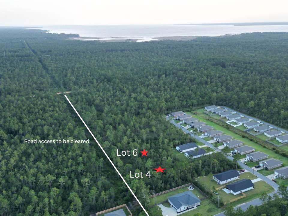 lot 4- Build Your Custom Home in an Established Neighborhood 
Don't miss this opportunity to own Lot 4, Lot 6, or both together in an established neighborhood with public water and sewer available. Lots may be purchased together or separately, offering flexibility for homeowners, builders, or investors. Zoned R-1, these parcels are designated for site-built homes only (manufactured homes are not permitted). A Wetland Study will be required prior to development. The property is located in Flood Zone X, meaning it is not within a designated flood hazard area. An access agreement with the Public Works/Road & Bridge Department will be required, and the buyer will be responsible for clearing the access. While public water and sewer are available, there are no existing sewer laterals, as the area is served by a force main. WANT BOTH LOTS SEE mls 10008500