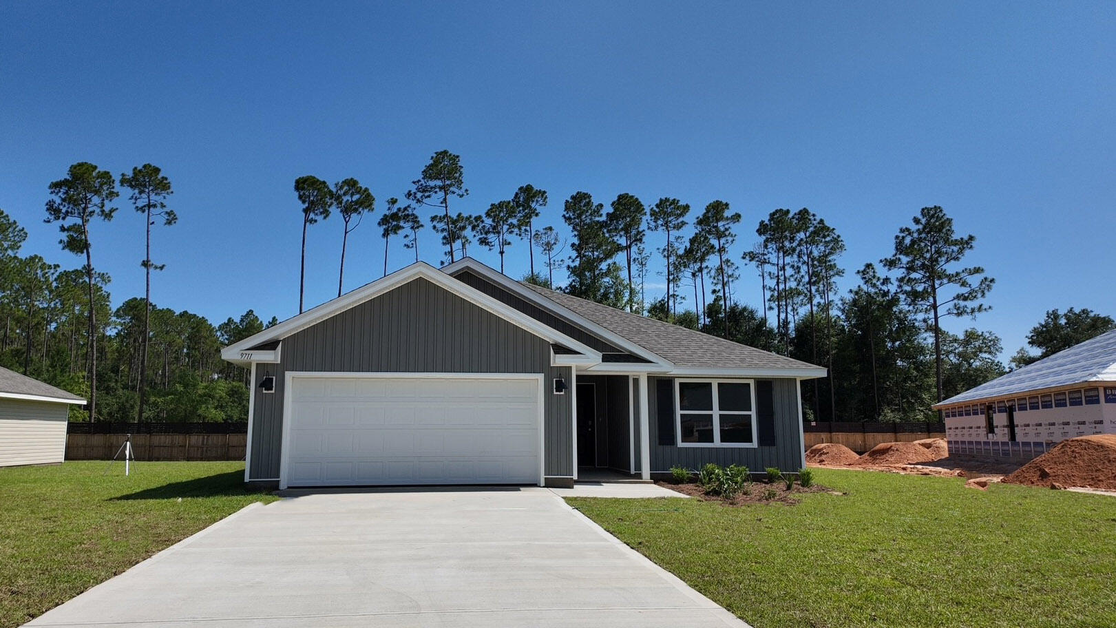 Welcome to the Lismore Plan, at Liberty Farms, our new home community in Milton, Florida! Just under 1,600 square feet, this beautiful single- story home offers 3-bedrooms with 2-bathrooms, a 2-car garage, and a seamless open layout with charming features. A 'Smart Home Connect' System with various convenient Smart Home devices. The well-appointed kitchen includes stainless steel appliances, a smooth-top range, built-in microwave, quiet dishwasher, corner pantry, island bar, eye-catching wood-look flooring, and plush carpet in the bedrooms. Quartz Countertops in the Kitchen & Baths. Fabric Hurricane window and door protection is also included. Enjoy the stylish curb appeal in this rapidly growing area with easy access to the interstate. ALL LISTING pictures, colors, features, and size may vary. Square footages are approximate.