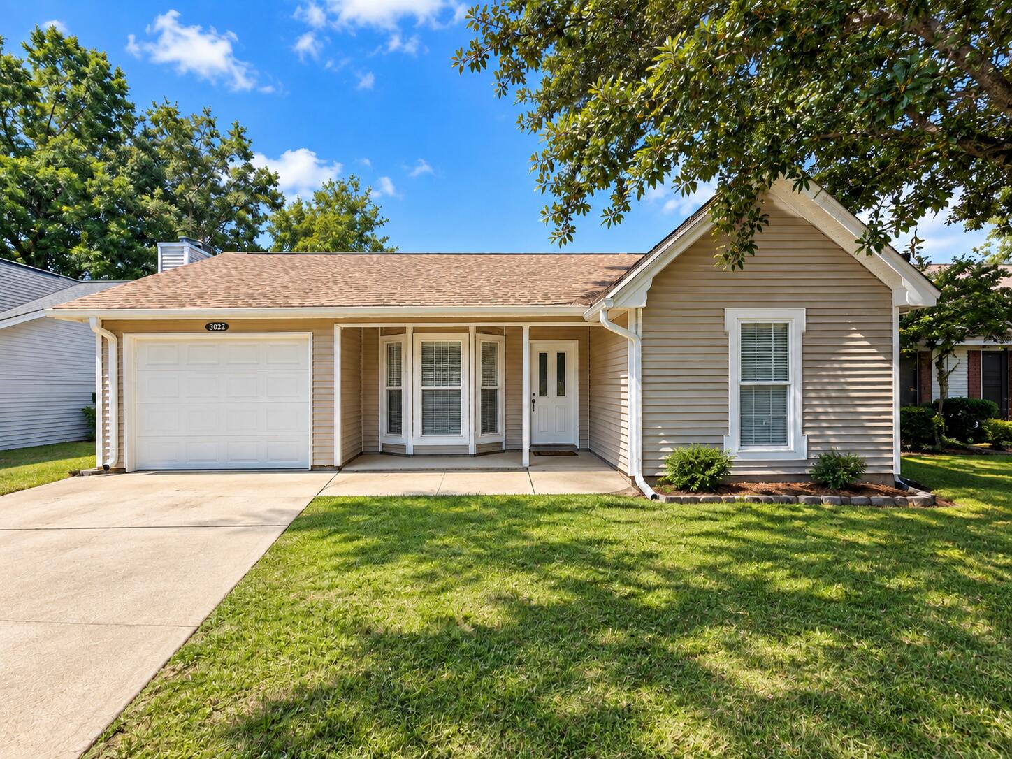 Welcome to Blue Pine Village in Bluewater Bay, known for its mature landscaping and convenient location near Eglin AFB, local schools, shopping, dining, and the beautiful Emerald Coast beaches. This cozy 3-bedroom, 2-bath home offers 1,138 square feet of comfortable living space with a bright, inviting layout and LVP flooring throughout. Natural light fills the main living area, highlighted by a charming front bay window as well as a fireplace, while the functional galley kitchen (complete with flat cooktop stove, stainless fridge, and pantry) remains open and connected to the living and dining spaces for an easy flow. The three bedrooms in this split floorplan offer surprisingly generous space (the primary ahs its own ensuite, and the two guest rooms share a second full guest bath), and the one-car garage provides added convenience and storage.  Recent updates include a roof replacement in 2022, a gas water heater installed in 2023, and a new back deck added in 2025. Residents of Blue Pine Village also enjoy access to a community pool, along with additional storage options for boat and RV parking. Pets may be considered on a case-by-case basis with prior owner approval and a non-refundable pet fee. No smoking, including vaping. With its comfortable interior, thoughtful updates, and prime Niceville location, this home offers an inviting place to live in the heart of Bluewater Bay.