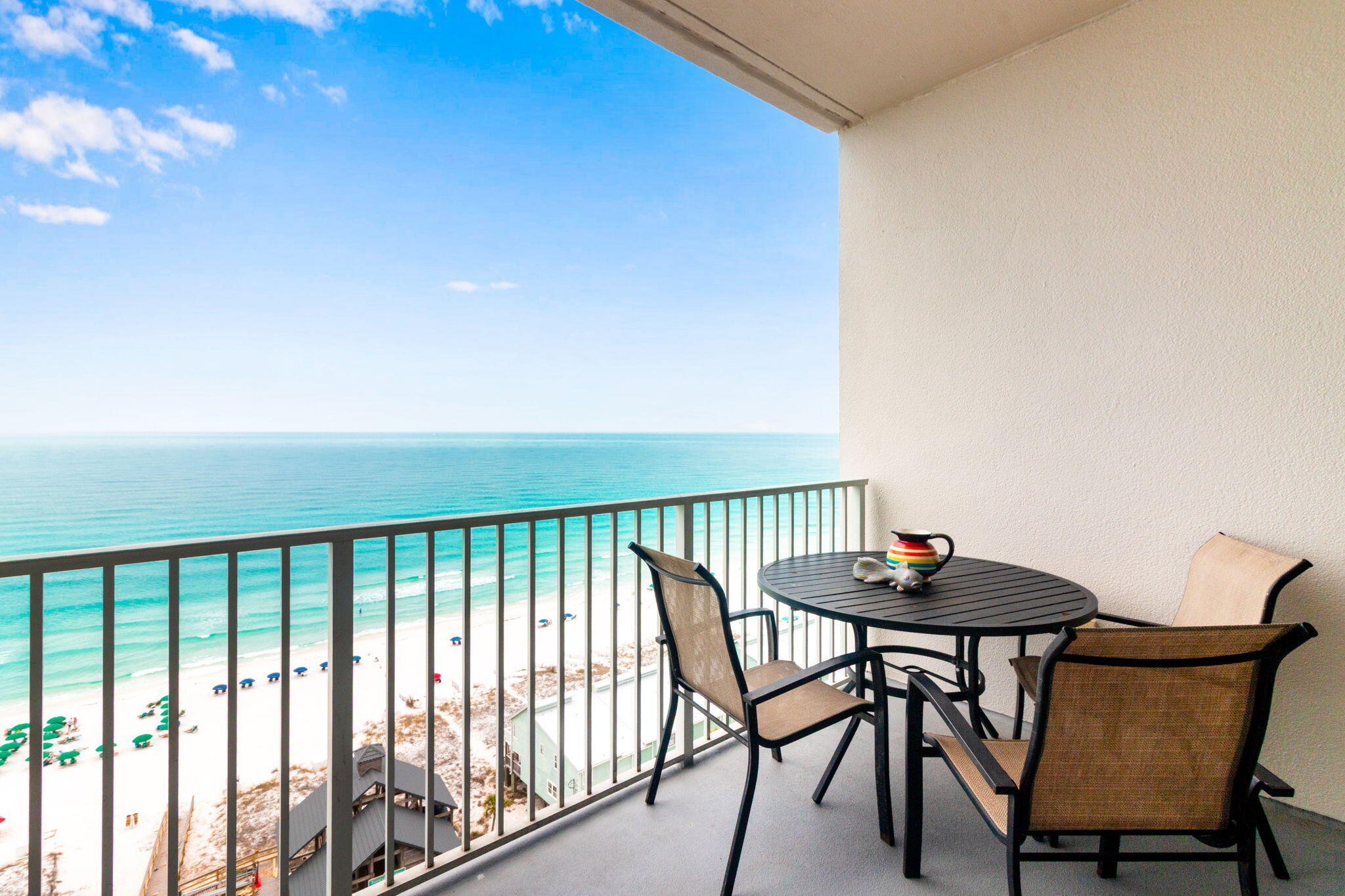 Rarely available top-floor condo at Leeward Key, ideally positioned along Scenic Gulf Drive in Miramar Beach. Unit 1204 captures sweeping Gulf views from the moment you enter, with 10' ceilings, floor-to-ceiling glass, and a private balcony made for sunrise coffee, sunset evenings, and coastal breezes. This rental-ready retreat offers an updated kitchen, refreshed furnishings, flat-screen TVs, new lighting, bar seating, and comfortable sleeper sofas for added guest space. 
The Gulf-facing primary suite features oversized windows framing the emerald water views. Leeward Key is especially loved for its unique beachside pool, giving owners and guests the rare convenience of poolside lounging just steps from the sand.