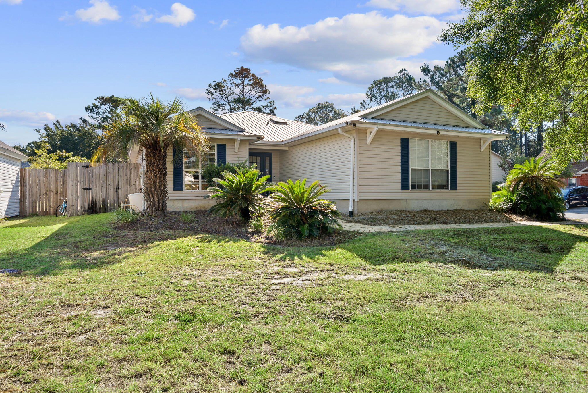 LOCATION. LOCATION. LOCATION. Investors  if you've been looking for a prime opportunity for a fix and flip project, THIS is your sign. Now offered at a dramatically improved price of $350K, AS-IS, this is a massive equity play -- most available land and lots in this highly desirable area are priced significantly higher than this move-in ready home. Tucked away in the desirable gated community of Magnolia Creek, this immaculate 3-bed, 2-bath home on an oversized corner lot is perfectly situated to capitalize on a prime fix-and-flip opportunity. You are just 2 miles from the sugar-white sands of Ed Walline Beach Access and minutes from Cessna Landing and Chat Holley, giving you exceptional proximity to both the Gulf and the bay. While updates, landscaping, and deck improvements are needed for maximum return, the value-add potential is huge, including an expansive, fenced backyard with room to add a private pool or expand the home's footprint. This home provides high-end starting points, including Italian porcelain tile, a remodeled primary ensuite, a chef-inspired kitchen with triple ovens, and a fenced backyard on an oversized lot. This is a steal in a community this close to the sugar sand beaches of 30A. Boating enthusiasts will love the proximity to public boat launch at Cessna Landing. Schedule your private showing today before this investment opportunity gets snatched up. Buyer to verify all room dimensions.