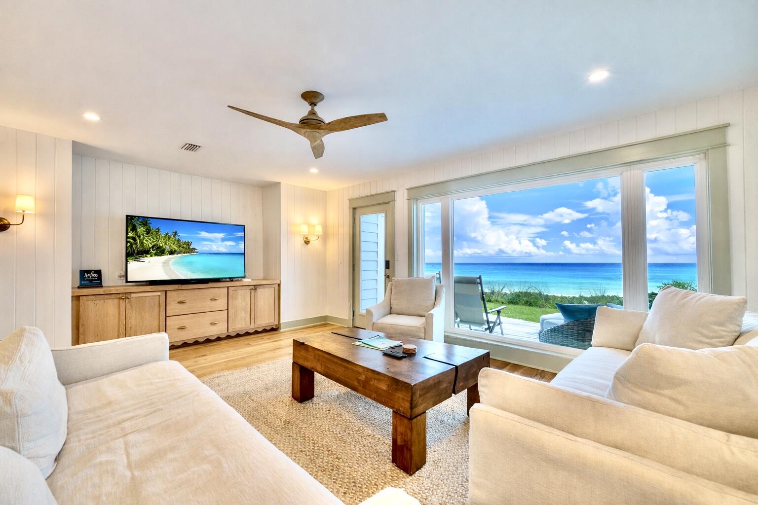 Enjoy the best and highest views on Scenic Highway 30A in this fully renovated two bedroom, two and a half bathroom condo at Sea Bluffs in Blue Mountain Beach. Sea Bluffs is nestled 65 ft above the beach and features private beach access for you and only 19 other condo units. When you enter the unit, you are greeted with gorgeous beach views through the large living room windows. The open concept plan boasts a coastal chic living room, dining room and kitchen on the main floor, in addition to a hallway bunk and a half bathroom. An inviting porch off the living room invites you to enjoy incredible sunrises and sunsets, not to mention access to a full day of playing at the beach. The second floor hosts the master suite and guest suite. Relaxation awaits in the beautiful, oversized master suite with ample sunlight from two sets of sliding doors that lead to the balcony. The master bathroom features a claw foot soaking tub, shower and double vanity complete with marble countertops and floors. The guest suite features a vaulted ceiling and generous space for guests to unwind. The guest bathroom includes an oversized shower with multiple shower heads. The condo can comfortably sleep 10 guests and has actual rental income that exceeds $100K annually. The condo was fully renovated in 2023 with custom cabinetry and solid white oak floors throughout the home, soapstone countertops in the kitchen, V groove and Shiplap walls, Moroccan Zeilege tile, furniture and fixtures from Arteriors, Rejuvenation, Visual Comfort, Pottery Barn, Anthropolgy, and more. Sea Bluffs has an agreement with La Dulce Vita for any beach chairs, umbrellas, bikes, kayaks and more.