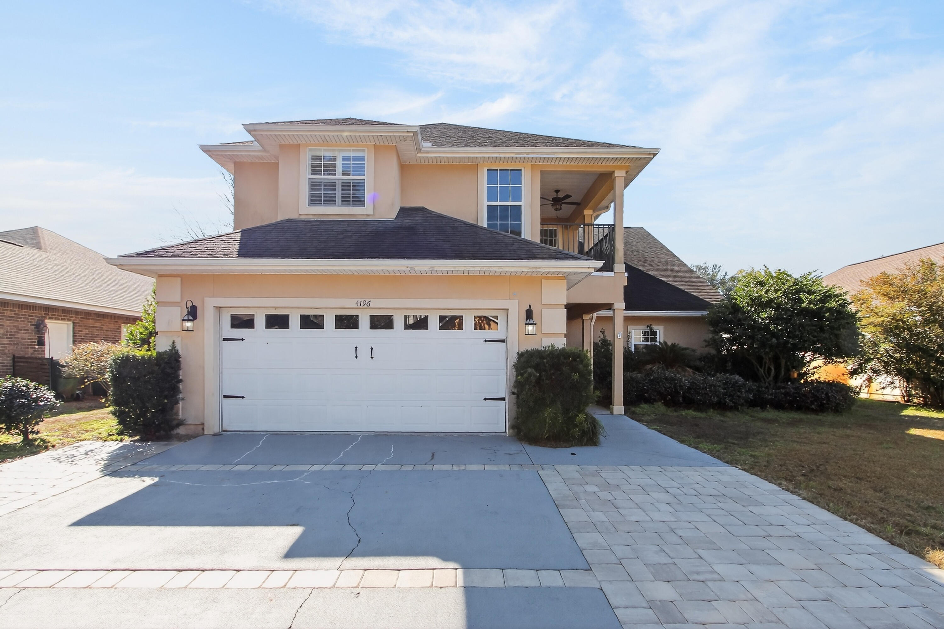 VA Assumable Loan Rate 2.75%! Nestled in the desirable Rocks Cove community of Bluewater Bay, this remarkable 4-bedroom, 2.5-bath home offers 3,182 square feet of thoughtfully designed living space on a quiet cul-de-sac just minutes from the sparkling waters of Choctawhatchee Bay and convenient public boat ramp access. This spacious three-story residence welcomes you with an open floor plan, soaring ceilings, and a warm, inviting atmosphere. The living area showcases built-in shelves, recessed lighting, two ceiling fans, and a cozy fireplace, along with direct access to a tiled, screened-in Florida room with dramatic 14-foot ceilings. A sliding glass wall system opens fully to create a seamless indoor-outdoor entertaining space perfect for relaxing or dining year-round. Adjacent to the living room, the open dining area easily accommodates large gatherings and is beautifully enhanced with crown molding that continues throughout the main living spaces. The kitchen is designed for both style and function, featuring granite countertops, abundant cabinetry, recessed lighting, stainless steel appliances, a pantry, and a generous island with a breakfast bar ideal for casual meals or additional seating. The first-floor master suite offers comfort and privacy with direct access to the back patio. The master bath includes a double vanity, Whirlpool tub, walk-in shower, and a spacious walk-in closet with built-in shelving. Upstairs, three generously sized guest bedrooms each include ceiling fans and plantation shutters, with one bedroom boasting its own private balcony. The upper-level bathroom features a double vanity, tile flooring, and a shower/tub combination. The home also includes a central vacuum system, a second-floor laundry chute, and a bonus landing area for added versatility. A major mechanical update was completed in October 2021 with the installation of new upstairs and downstairs HVAC units. A standout feature of this home is the impressive 500-square-foot bonus room on the third floor an incredible space with endless possibilities. Located directly across from the Bluewater Bay Marina and just minutes from the Mid-Bay Bridge, this home also offers access to exceptional community amenities including four pools (one heated), two championship 18-hole golf courses, award-winning tennis facilities, a full-service marina, a clubhouse with a restaurant, parks, and a playground. With its prime location, thoughtful upgrades, and expansive layout, this home is truly a must-see.