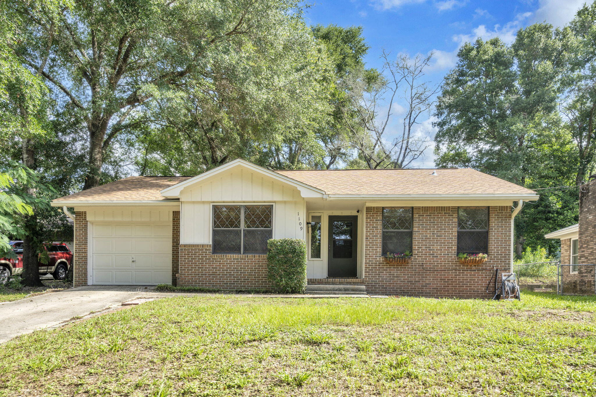 Beautifully updated home in the heart of Niceville! The renovated kitchen boasts white shaker cabinetry, stainless steel appliances, and plenty of workspace.  
The spacious living area is filled with natural light, while the brick exterior and inviting front entry create timeless curb appeal. Enjoy the convenience of a one car garage, low maintenance flooring, and tasteful updates throughout. The backyard, complete with covered patio, offers plenty of room for outdoor entertaining, gardening or simply relaxing. 
Located just minutes from top rated Niceville schools, shopping, dining, Eglin AFB, Duke Field, and the beautiful Emerald Coast beaches, this move-in ready home is an excellent opportunity for anyone looking to enjoy all that Niceville has to offer! Roof replaced in August 2025, New AC in September 2022. Washer and dryer conveys.