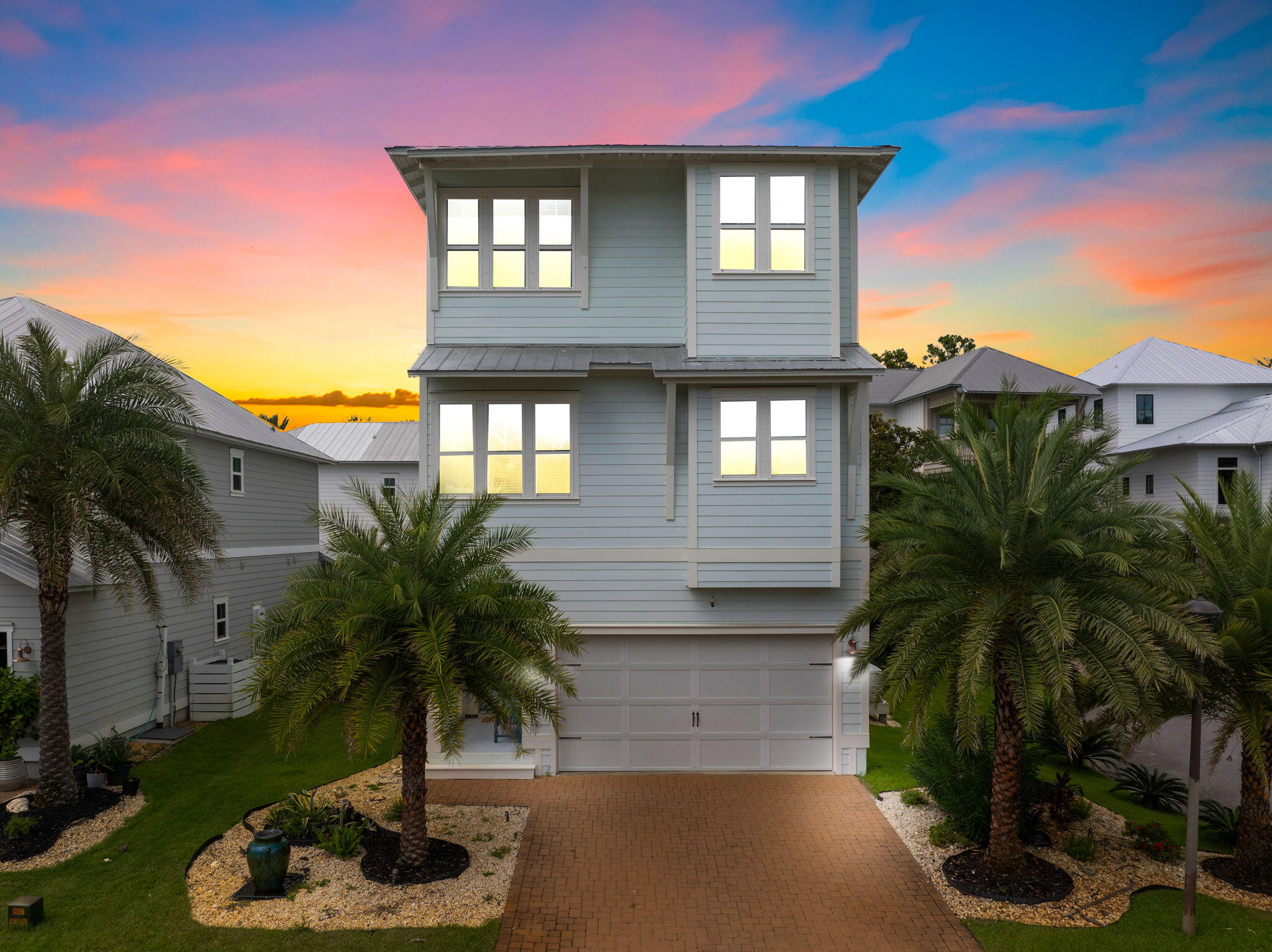 OWNER FINANCING AVAILABLE with 20% down! Over 100K rental potential! Welcome to a beautifully designed 3-story coastal home in Inlet Beach, located 0.5 miles from the Gulf's white sand beaches and one of the largest public beach accesses in the area. This spacious 4-bedroom, 3.5-bath residence offers excellent short-term rental potential with a layout designed for large groups, including a first-floor game room with bunk beds, open-concept living areas, and a luxurious primary suite. Outdoor living includes a private patio with fire pit, ideal for relaxing after a day at the beach. Community amenities include a resort-style pool, pavilion, and access to Lake Powell, one of the area's rare coastal dune lakes connecting to the Gulf. This home offers an exceptional opportunity along Scenic 30A.