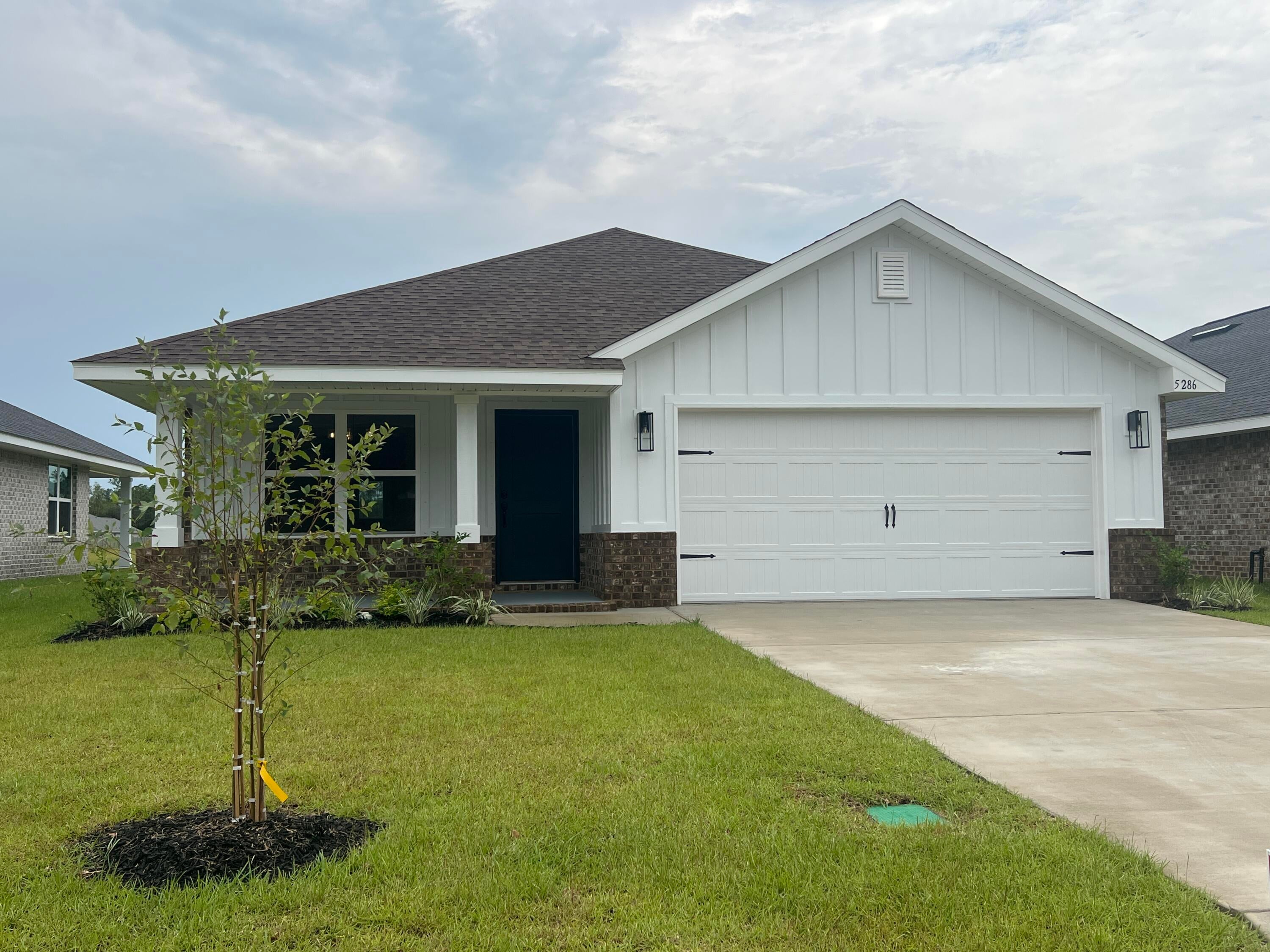 Welcome to HIDDEN PINES by Adams Homes. Located just 30 minutes to Navarre Beach, with close proximity to schools, shopping and much more. This home is 3-sided brick with Hardi design front, 2 car automatic garage, sprinklers with timer, and a sodded yard with a landscaping package. Some upgrades that are being added to this home include granite/quartz countertops in kitchen and bathrooms, Puretec LVP flooring everywhere with carpet only in bedrooms, craftsman style elevation, and garden tub in the master bathroom.