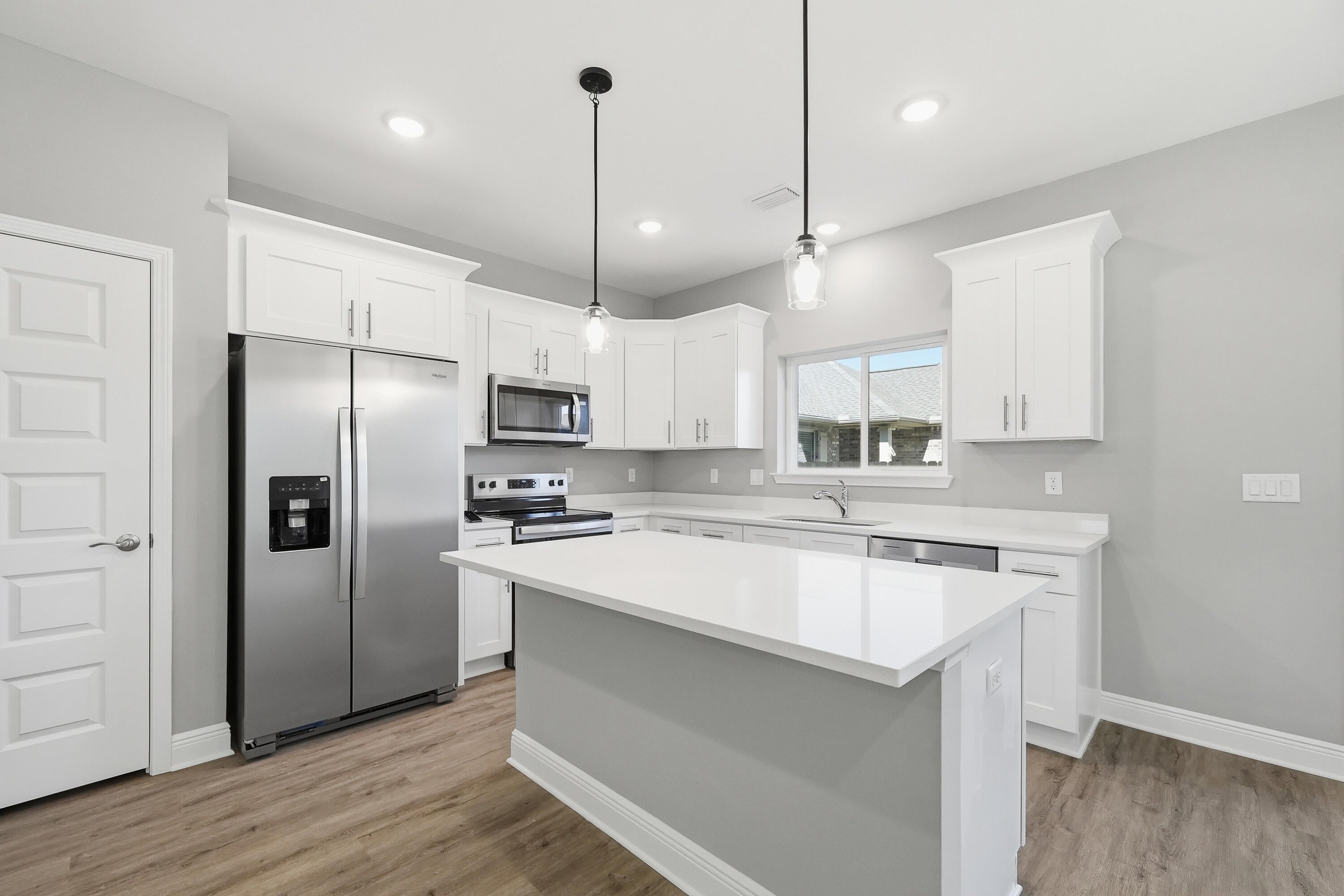 Convenient location, $15,000 anyway money, low insurance premiums, home warranty, brand new appliances with additional warranties, tranquil community, and more! These brand NEW townhomes have so much to offer. They are also equipped with upgraded countertops, refrigerator, blinds, and lots of room to make it your own. 3 bedrooms, 2.5 bathrooms, private garage, oversized master closet, and more- make an appointment to see this home today! Partnered with a local lender, eligible buyers could qualify for a much lower interest rate with either a permanent or temporary rate buy down, ask your agent for details! You are only a short drive to the beautiful Emerald Coast beaches, and a walk or bike ride to Lowe's, Wal Mart, Chick-Fil-A, IHOP, and more!
