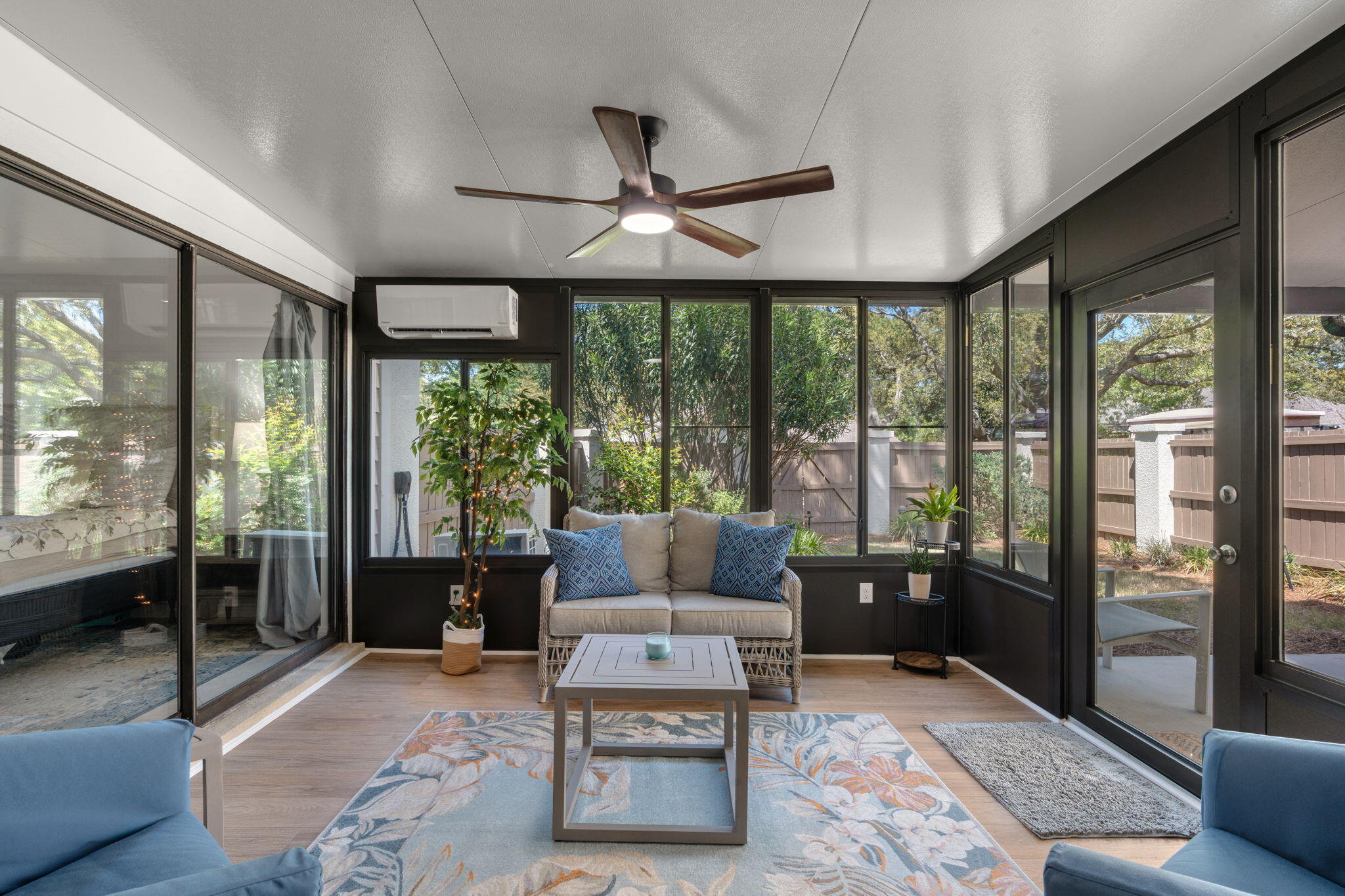 SPACIOUS home with a great, flexible floor plan- 4 beds and 2 baths all on ONE LEVEL on a very private .19 acre corner lot with a COMPLETELY fenced  back yard located within Sandestin Golf and Beach Resort! L'Atrium is located on the quieter bayside of the resort very close to the new Audubon Community pool! The home has a new roof (2021), new exterior paint (2025), custom garage door, newer water heater,new HVAC and ducting (2022), new heated/cooled Florida room and a back gate to allow additional  golf cart parking. Home has been wired for a whole house generator and rewired with high speed fiber cable. Low HOA fees of just $275/mo provides you weekly landscaping (front and back) and pest control. Truly a fantastic permanent resident or 2nd home! Sandestin Golf and Beach Resort features more than seven miles of beaches and pristine bay front, four championship golf courses, 15 world-class tennis courts, pickleball courts, 108 catch and release ponds stocked with bass (no fishing license required), a 226-slip marina, a fitness center, spa and celebrity chef dining. Shop, dine and play at the charming pedestrian village, The Village of Baytowne Wharf and more. Inside the gates of the resort, residents of the 72 distinctly different neighborhoods enjoy a balanced lifestyle of high-class living, spanning 2,400 acres from the beach to the bay. There are just over 4600 properties within the gates which offer 24 hrs./day gated security. Everything within the gates of the resort is accessible by golf cart or bicycle. The entire resort is interconnected by miles of pedestrian, bike and golf cart paths that weave through groves of live oaks, meandering past natural lagoons, fountains, man-made lakes, and meticulously landscaped fairways.
Just beyond the gates, Grand Blvd with its weekly farmers market, varied events and superb section of dining and shopping is readily accessible by golf cart. The Market Shops, on the south side of highway 98, boasting more dining and shopping choices, is easily accessible utilizing the tunnel beneath Hwy 98