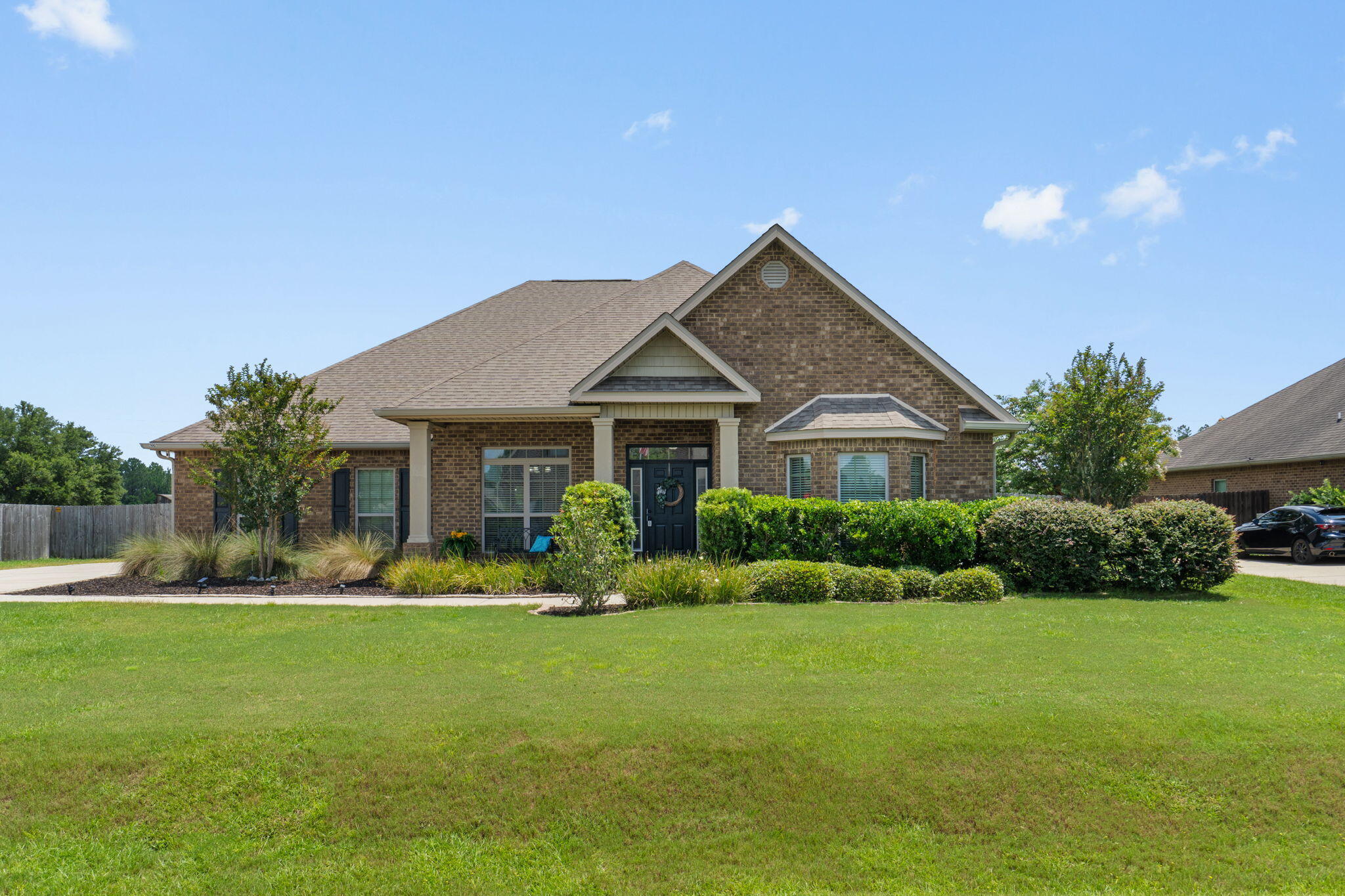 Looking for space inside and out? THIS IS THE ONE! Over 3100 sqft, 5 spacious bedrooms, 3 FULL bathrooms, plus a formal dining room and office space! This split floor plan design gives each area its own private feeling while also having large living spaces for all of your entertaining needs! The kitchen features granite countertops, breakfast bar, island, stainless steel appliances, and a walk-in pantry. The master suite is tucked away with added privacy, has a trey ceiling, space for a sitting area and a large master bathroom with tile shower and separate soaker tub. The master closet comes with custom racks and ample space for storage! Looking for some quiet time? Sneak out your private entry/exit door to the covered back porch that overlooks the expansive back yard. This home sits on over half an acre and has endless possibilities! Additional features include: whole house gutters, outdoor fire pit area, yard building, sprinkler system (partial), and custom cabinets in laundry room. This home is a stone's throw from Garden City Park (playground, ball fields, etc!) and only minutes to schools and shopping. If space is what you want- this home is what you need! Schedule your showing today!