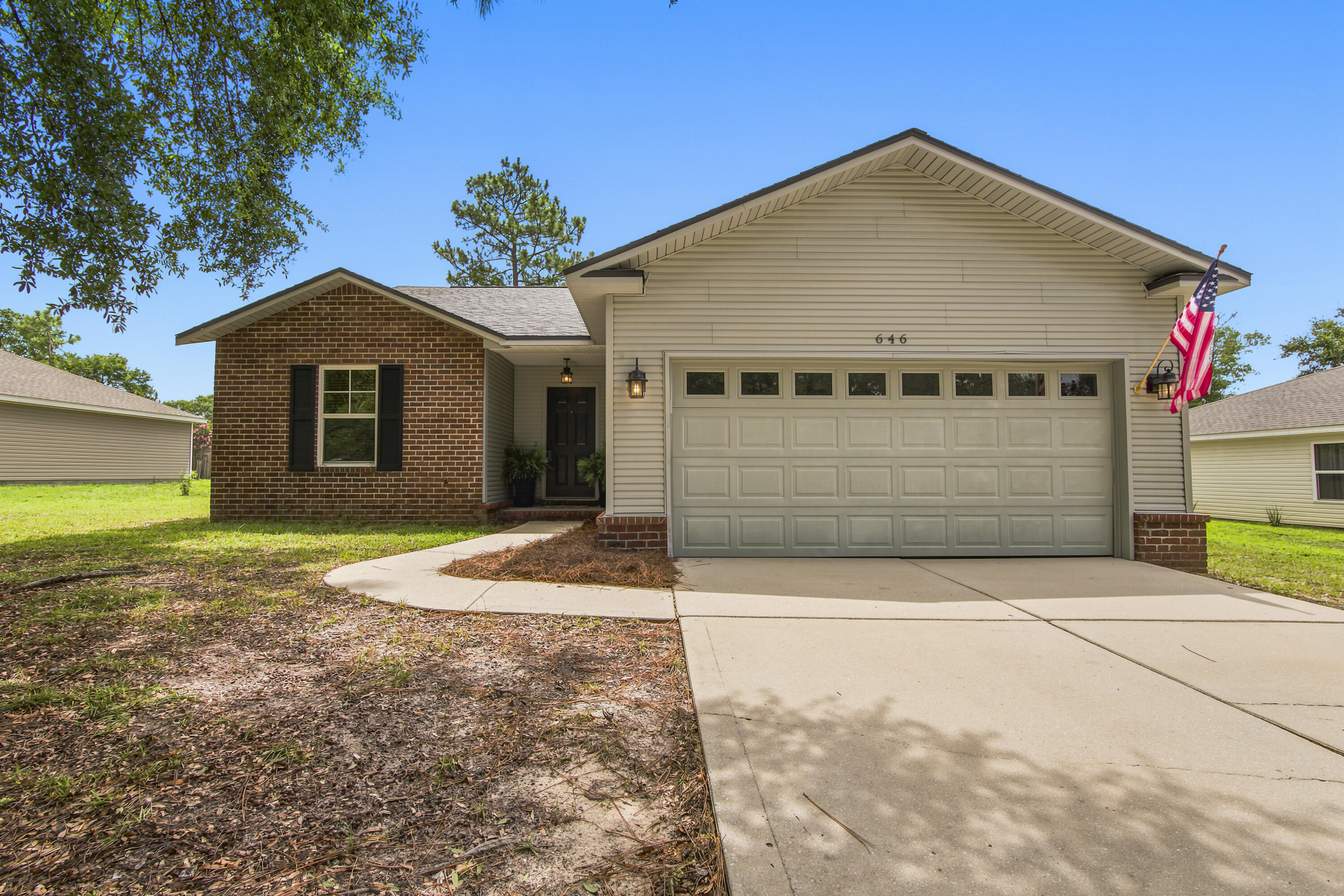 Some neighborhoods just feel like home, and Hunter's Ridge is one of them.

Nestled among mature trees with underground utilities, Hunter's Ridge is one of DeFuniak Springs' most established neighborhoods, known for its quiet streets, evening walks, bike rides, and friendly community atmosphere. Tucked away for privacy while remaining just five minutes from everything, you'll love being directly behind Walton High School, within walking distance of the popular Wee Care Park, and just minutes from city parks, Downtown DeFuniak Springs, shopping, and dining. Even better, HOA dues are just $115 per quarter, making it easy to enjoy the benefits of this community at an affordable cost.

Built in 2012, this beautifully maintained brick-accented home is truly move-in ready and has been thoughtfully updated for its next owners. New luxury vinyl plank flooring installed in 2024 flows throughout the home, complemented by a desirable split-bedroom floor plan that offers both privacy and functionality.

The kitchen is designed for everyday living and entertaining, featuring stainless steel appliances, a breakfast bar, and a spacious pantry. All appliances convey, including the washer and dryer. The oversized two-car garage enters directly into the laundry room, pantry, and kitchen, making unloading groceries effortless. The spacious primary suite is tucked away for privacy and offers peaceful views of the backyard along with a large walk-in closet. On the opposite side of the home, two comfortable guest bedrooms each feature generous double-door closets and share a centrally located full bathroom, creating a functional layout that's ideal for a family or overnight guests.

Major mechanical updates provide added peace of mind, including a 2022 HVAC system and 2022 water heater, allowing you to spend more time enjoying your home and less time worrying about maintenance.

Step outside to the covered back porch overlooking the backyard, the perfect place to enjoy your morning coffee, grill with friends, watch the kids or pets play, or simply relax after a long day.

Move-in ready, thoughtfully updated, and nestled in one of DeFuniak Springs' most beloved neighborhoods, this is more than just a house, it's a place to call home. Come experience the Hunter's Ridge lifestyle for yourself.