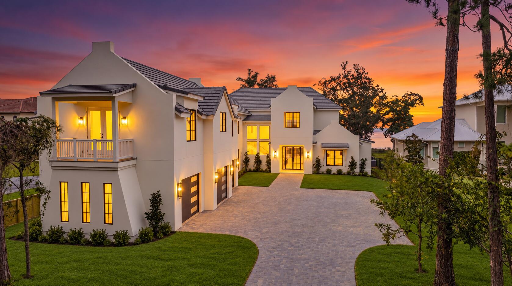 Set along the bay in sought-after Driftwood Estates, 525 Driftwood Point Road is a newly constructed residence defined by thoughtful design, refined materials, and an exceptional connection to the outdoors. Created for both relaxed coastal living and effortless entertaining, the home pairs generous gathering spaces with private retreats and resort-inspired amenities. The outdoor living spaces are a natural extension of the home, thoughtfully designed for both relaxation and entertaining. A spacious pool and spa anchor the backyard, surrounded by an expansive pool deck. Beneath the second-floor deck, a covered outdoor living area features a fully equipped outdoor kitchen and fireplace, all protected by motorized screens for year-round comfort. Above, an impressive 800-square-foot deck with composite decking and tempered glass railings preserves the stunning views and provides another exceptional space to unwind or entertain.

Inside, exceptional craftsmanship is evident in the carefully curated finishes and custom details throughout. The gourmet kitchen showcases elegant Taj Mahal countertops, premium Sub-Zero and Wolf appliances, custom white oak cabinetry, and a beautifully appointed butler's pantry highlighted by a striking wine feature wall. The bathrooms continue the home's refined aesthetic with walnut cabinetry, sophisticated stone surfaces, distinctive wallpaper, and thoughtfully selected finishes.

The primary suite offers a private retreat with direct access to the pool and backyard through expansive sliding doors. Its beautifully appointed en-suite bathroom is complemented by an oversized walk-in closet with convenient direct access to the laundry room, creating a space that is as functional as it is luxurious.

Designed to accommodate both everyday living and extended stays, the home also features a dedicated theater room, bunk room, elevator, and a complete in-law suite with its own kitchen, laundry, and private balcony. A spacious three-car garage offers abundant room for vehicles, recreational equipment, and additional storage.

With its exceptional bayfront setting, sophisticated interiors, and expansive resort-style outdoor living spaces, 525 Driftwood Point Road presents a distinctive opportunity to experience the very best of coastal living.