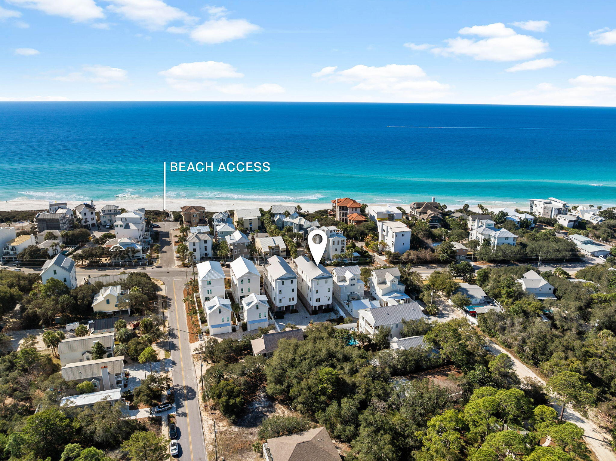 There is a reason people are drawn to this stretch of Scenic Highway 30A. The days begin with the Gulf shimmering just beyond the dunes, afternoons drift between the beach and coastal lakes, and evenings end beneath brilliant sunsets with Seaside only moments away. At 3325 E County Highway 30A, that rhythm of life becomes your everyday experience.

Rising four stories above the coastline, encompassing over 5800 square feet, this residence was designed to celebrate its surroundings at every turn. Expansive balconies span three levels, capturing panoramic Gulf views that become a constant backdrop to the home's beautifully curated interiors. With seven bedrooms and nine bathrooms, every space has been thoughtfully designed to welcome family and friends while maintaining an atmosphere of refined comfort and privacy.

The home's main living level is where life naturally unfolds. An open-concept design connects the kitchen, dining, and living spaces into one seamless environment where the Gulf remains in sight and conversation flows effortlessly from indoors to out. Whether hosting a holiday gathering, preparing dinner after a day on the beach, or simply enjoying a quiet morning coffee, the home is designed around moments that matter.
 On the first level, entertaining takes on an entirely different character. A fully appointed indoor and outdoor kitchen opens to the heated private pool, creating a setting where afternoons transition naturally into evenings beneath the coastal sky. Surrounded by lush landscaping and thoughtfully designed outdoor living spaces, it is equally suited for lively celebrations or peaceful afternoons spent poolside.

The primary suite offers a retreat unlike any other. A fireplace adds warmth and intimacy, while the spa-inspired bath, complete with a soaking tub and oversized walk-in shower, creates a space designed for restoration. Every bedroom throughout the home features its own ensuite bath, and two newly reimagined bunk rooms add both flexibility and style for larger gatherings.

Currently part of the highly regarded 360 Blue rental program, the property combines exceptional design with impressive performance, offering a projected annual rental income of approximately $400,000 for those seeking both a remarkable coastal residence and a well-positioned investment opportunity.

Located within the sought-after Gulf Shore Manor community, the home enjoys convenient access to both the Gulf and nearby coastal dune lakes. The boutiques, acclaimed restaurants, and unmistakable charm of Seaside are only minutes away, placing one of 30A's most celebrated destinations within easy reach while preserving the relaxed atmosphere that defines Seagrove Beach.

At 3325 E County Highway 30A, luxury is found not only in its scale or craftsmanship, but in the way the home embraces its surroundings. It is a place where Gulf views greet every morning, where gatherings naturally extend outdoors, and where the timeless beauty of 30A becomes part of everyday life.