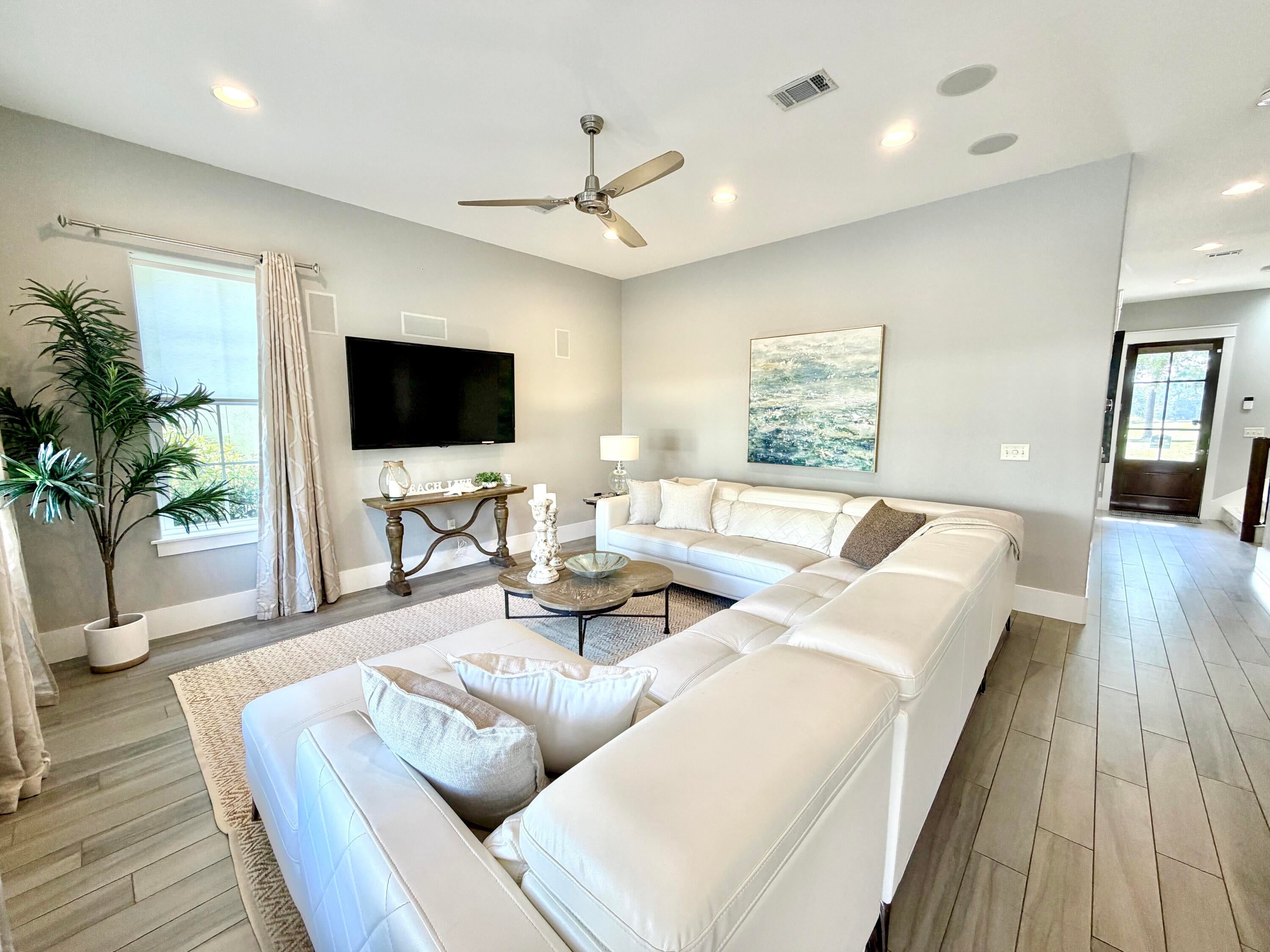 Imagine pulling into your driveway and never needing your car keys again. Your new coastal lifestyle begins with a brand-new, six-seater golf cart--included for free with the purchase of this stunning Mediterranean retreat. From morning coffee runs to sunset cruises, this is resort living at its most effortless and stylish.
Positioned on a premium lot, this home received a sophisticated refresh in the summer of 2026, featuring new windows, crisp interior paint, and gorgeous new flooring in the upper-level bedrooms. Offered fully furnished with curated decor, the interiors strike a perfect balance between high-end luxury and relaxed energy.
The heart of the home is an expansive open-concept layout that flows seamlessly into a chef's kitchen, outfitted with top-tier appliances and custom cabinetry. Privacy is paramount, with four generous bedrooms each serving as a sanctuary with its own dedicated en-suite bath. The primary suite offers a tranquil, spa-like escape to unwind after a day of recreation. This is a turnkey invitation to the best of the Emerald Coast. Grab the keys to your new golf cart and start living the dream today.