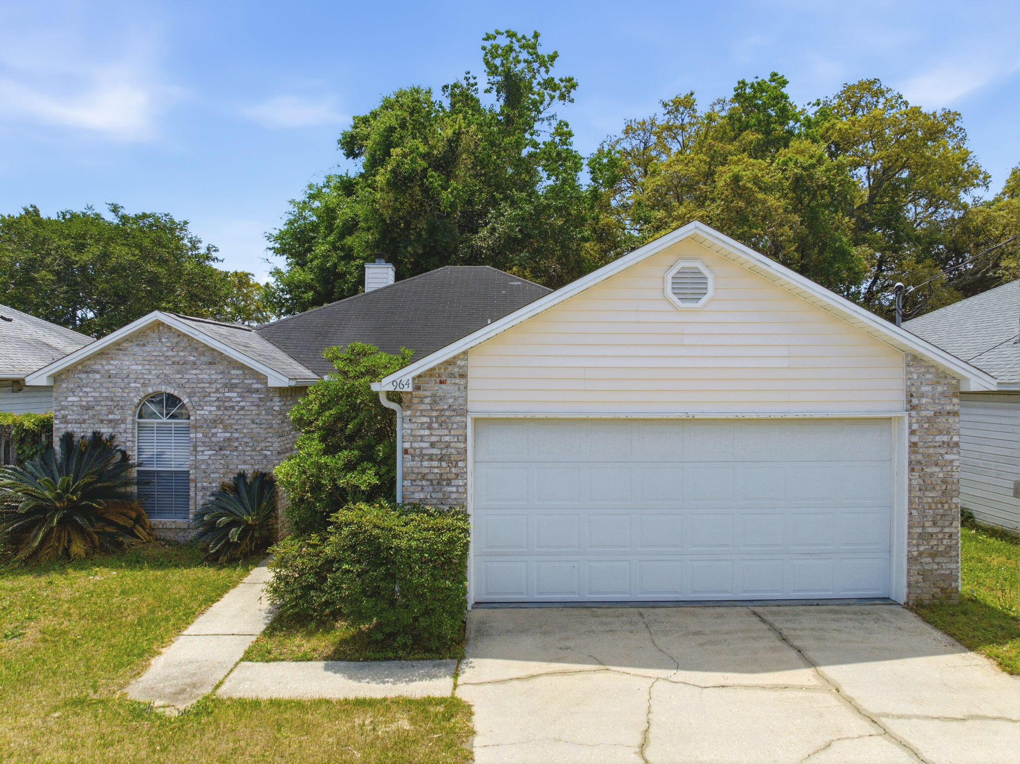You will love living in this charming 3BR/2BA Fort Walton Beach rental home. The home features a spacious living room with a beautiful fireplace, a great place to gather around on those few cool evenings. The open floor plan continues throughout the dining room and kitchen areas. The screened-in porch is perfect for barbecues and looks out over your large backyard, an ideal place for your pets to play.
The yard has a lawn pump and sprinkler system and a large two-car garage.
Conveniently located in the heart of Fort Walton Beach, this home is just minutes away from both Hurlburt and Eglin Air Force Base, in addition to some of the area's best shopping and restaurants.

Tenant pays for all utilities. Property will be held off market up to 14 days with Property Holding Fee with approved app