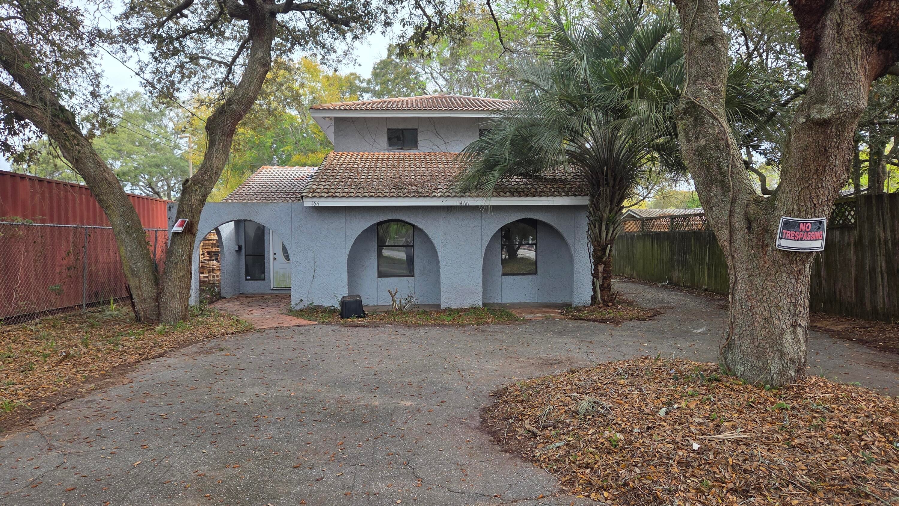 2 Story Office with front and side entrance.  Rear balcony with rear entrance to 2nd floor.  First floor has reception, 5 private offices, 2 restrooms, conference room.  2nd floor has 3 offices, large open area with coffee bar.  New glass in all the windows and new AC system.  Has two tax id numbers  
16-2S-24-0000-0025-0000 and 16-2S-24-2630-0002-0010