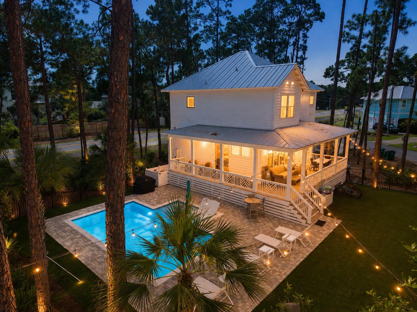 Beautifully designed and completed in late 2023, this 4-bedroom, 3.5-bath coastal retreat offers a private pool, oversized corner lot, and an ideal location on the west end of 30A--with no HOA. Offering approximately 3,350 square feet under roof and 2,418 heated and cooled, the home also boasts an impressive rental history of $110,000+ and is located just 1/3 mile from county beach access.

Inside, the coastal-chic, open-concept floor plan is designed for both entertaining and everyday living. The main level features a spacious living area, dining room, kitchen, and convenient mudroom. Upstairs, the primary suite is joined by a second bedroom with a private bath, while the bunk room and fourth bedroom share an additional full bath.

Outdoor living is a standout feature, with wraparound porches, spacious patios, private pool, and low-maintenance artificial turf lawn--creating the perfect setting to relax after a day at the beach or exploring 30A's shopping and dining.

Situated on a rare 0.41-acre corner lot, the property offers exceptional parking with a 1-car garage plus 3 driveway spaces. With its newer construction, strong rental performance, no HOA, generous outdoor space, and convenient beach access, this property is an exceptional opportunity for a primary residence, second home, or vacation rental investment.