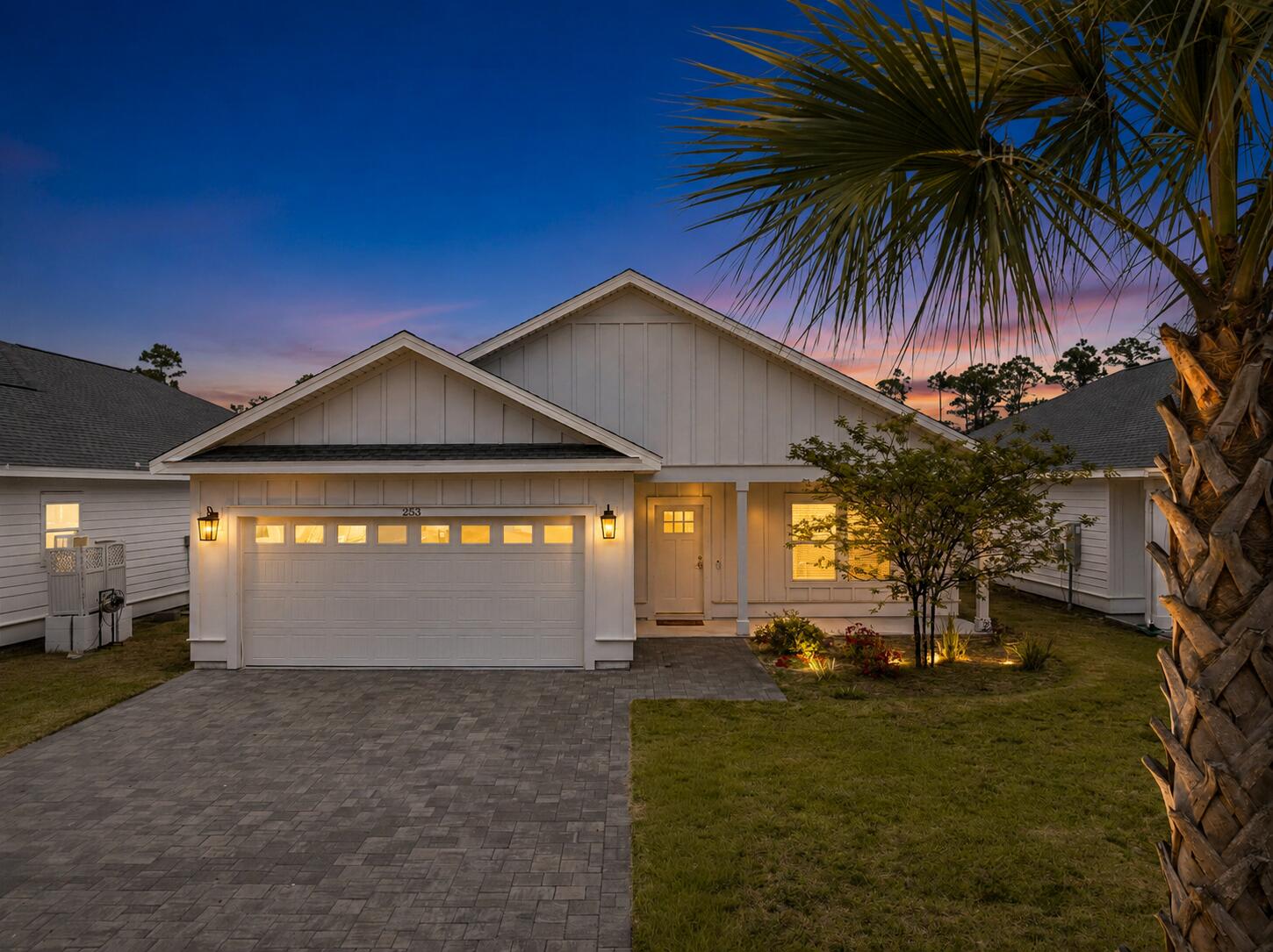 Modern 4BR Coastal Home in Gated Laguna Haven | Panama City Beach West End

Located within the gated community of Laguna Haven on Panama City Beach's desirable West End, this 2023-built 4-bedroom, 2-bath home offers a blend of modern design, low-maintenance living, and convenient access to some of the Emerald Coast's most sought-after destinations.

Designed for both everyday comfort and effortless entertaining, the open floor plan allows the living, dining, and kitchen spaces to flow seamlessly together. Quartz countertops, soft-close cabinetry, stainless steel appliances, a walk-in pantry, crown molding, and wood-look porcelain tile create a clean coastal aesthetic throughout the main living areas.

Privately positioned, the primary suite features tray ceilings, a spacious walk-in closet, and a beautifully finished tiled shower. Three additional bedrooms provide flexibility for family, guests, a dedicated home office, or additional sleeping space for visiting friends and relatives.

Outside, a covered rear porch overlooks a professionally landscaped backyard complete with irrigation and a peaceful water feature, creating an inviting setting for morning coffee, outdoor dining, or relaxing after a day at the beach. Hurricane shutters, Flood Zone X designation, low HOA fees, and gated entry provide added peace of mind. Life on Panama City Beach's West End offers a unique blend of convenience and coastal living. Spend your mornings on the sugar-white sand beaches of the Gulf, afternoons exploring Lake Powell or nearby 30A, and evenings enjoying the restaurants, shopping, and entertainment of Pier Park. Carillon Beach, Scenic Highway 30A, and Northwest Florida Beaches International Airport are all just minutes away, making this location ideal for both full-time residents and second-home owners.

Short-term rentals are permitted, providing the flexibility to enjoy the property as a primary residence, vacation retreat, or investment opportunity with the potential to offset ownership costs when not in use.

Combining modern construction, quality finishes, and an exceptional West End location, this move-in-ready home offers an opportunity to enjoy the relaxed coastal lifestyle of Florida's Gulf Coast.