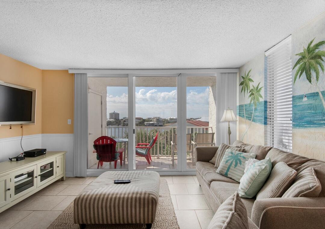 Tucked away on the coveted Holiday Isle peninsula, this beautifully furnished 2-bedroom, 2-bath harbor-front condo offers the perfect blend of coastal relaxation and resort-style amenities. Renovated in 2021, the residence features thoughtful updates throughout and is ready for immediate enjoyment as a primary home, vacation retreat, or income-producing investment.

Wake up to peaceful harbor views and spend your days enjoying everything that makes Destin special. Dolphin Point residents enjoy private deeded beach access on the Gulf, creating the rare opportunity to experience both harbor and beach lifestyles from one exceptional location. A quick water taxi ride places you at HarborWalk Village, where dining, entertainment, and waterfront activities await.

Recent community improvements include gated entry, refreshed landscaping, an updated heated pool, and a new pool house. Additional amenities include a marina with boat slips available for purchase or lease, tennis and pickleball courts, a kayak and paddleboard launch, grilling areas, golf cart parking, owner storage, onsite management, and 24-hour security.

Whether you're seeking a full-time residence, a weekend escape, or a turnkey investment property, this Holiday Isle retreat delivers the very best of Destin living.