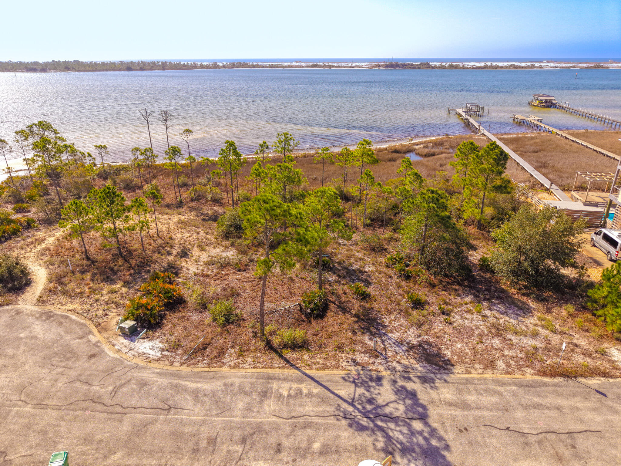 Build your dream estate on this exceptional oversized waterfront lot with plenty of room to build a private dock in the gated community of Cobia Bay South. With ample room to build a grand coastal retreat, this property offers the potential for stunning Gulf views and is just a short boat ride to Crab Island and the Destin Pass. A rare opportunity to own prime waterfront in an unbeatable boating location.