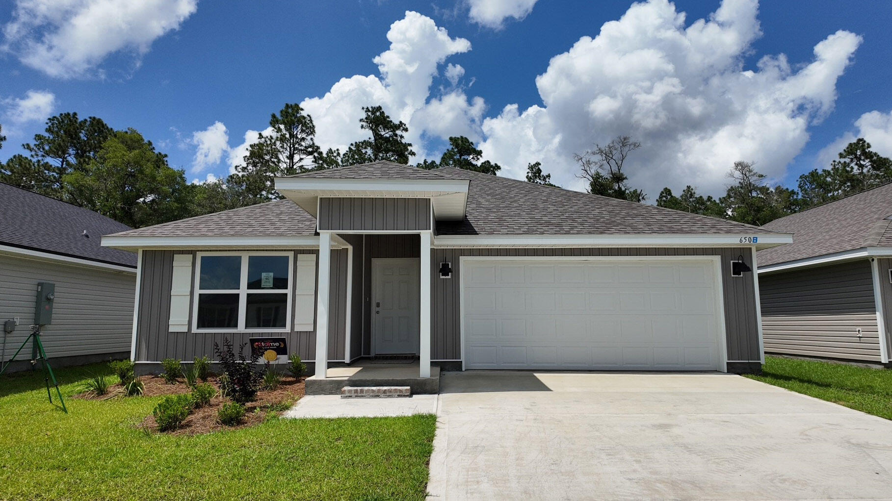 Welcome to Rivers Cove featuring a beautiful community pool and playground. The Cali model, one of our most sought-after designs, offers a fantastic open layout for relaxed living. Offers 4 bedrooms, 2 bathrooms, a covered back patio, 2-car garage, and the 'Smart Home Connect' System with various convenient Smart Home devices. The well-appointed kitchen includes stainless steel appliances, a smooth-top range, built-in microwave, quiet dishwasher, corner pantry, island bar, eye-catching wood-look flooring, and plush carpet in the bedrooms. Bedroom 1 and the adjoining beautiful bath boast a large walk-in closet, double vanity sinks and more. Fabric Hurricane window and door protection is also included. ALL LISTING pictures, colors, features, and size may vary. Square footages are approximate.