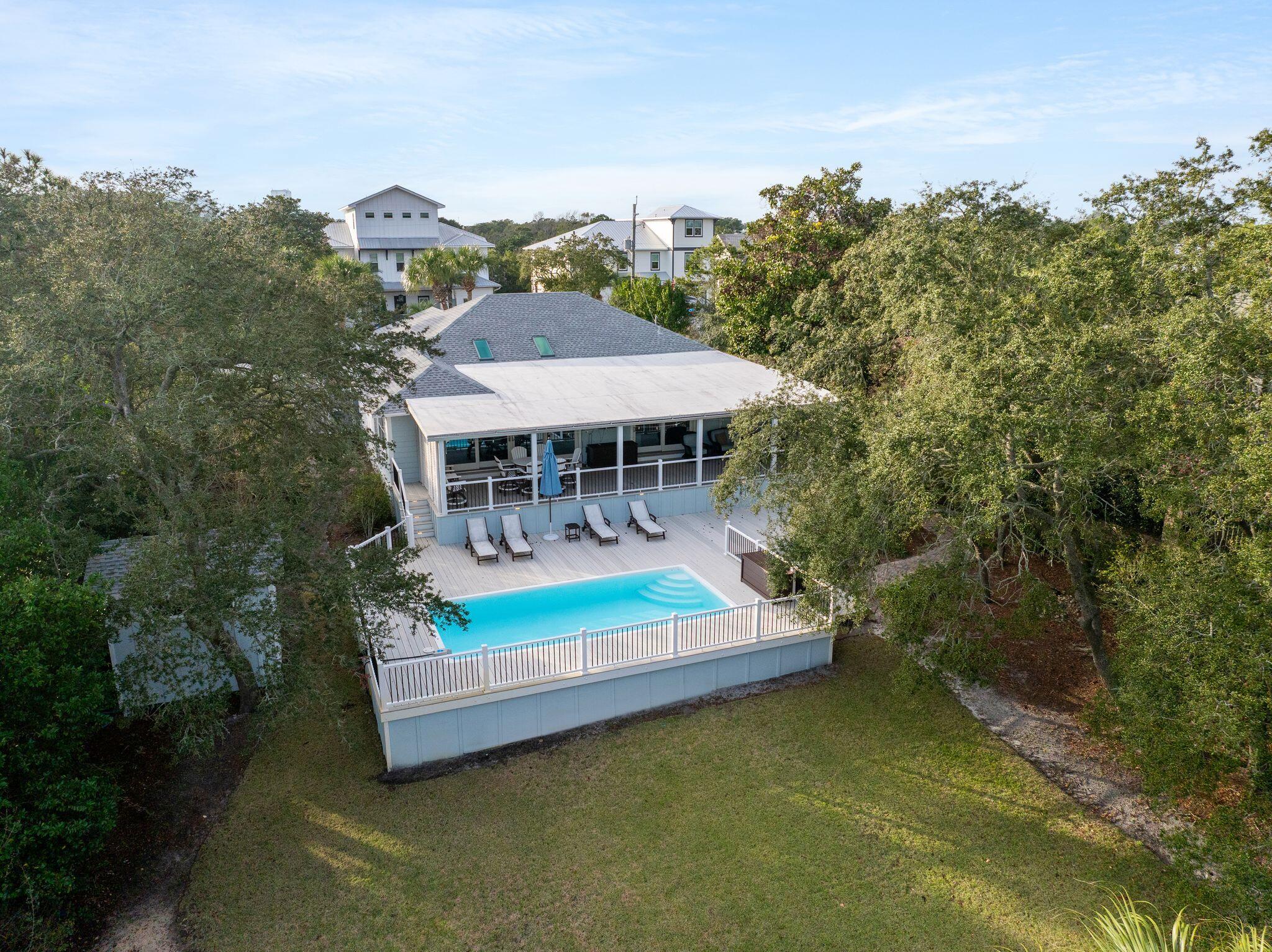 Discover a rare blend of coastal elegance and serene lakefront living in this exceptional retreat, quietly tucked within the coveted Gulf Pines community of Miramar Beach. Offered fully furnished, this thoughtfully curated residence is truly turnkey, allowing for immediate enjoyment or seamless rental potential. Set on just under half an acre with 72 feet of lake frontage and walking distance to the beach, the property offers privacy, space, and a lifestyle that is increasingly difficult to find along the Emerald Coast.

The home features four bedrooms and three baths, including two ensuite bedrooms, providing comfort and privacy for both owners and guests. Light-filled interiors flow effortlessly to the outdoors, where a private pool, expansive deck, and personal dock create a tranquil setting for relaxing, entertaining, or enjoying peaceful afternoons on the water.

Culinary moments are elevated with a fully equipped gourmet kitchen and outdoor grilling area, ideal for al fresco dining while overlooking the serene lake. The home's furnishings and finishes complement the coastal setting, blending refined style with relaxed sophistication.

One of Gulf Pines' most extraordinary distinctions is its private, neighborhood-only beach access, offering over 1,000 feet of dedicated shoreline--never crowded, no vendors permitted, and complete with a private beach pavilion exclusively for residents. This level of beachfront privacy is exceptionally rare on the Emerald Coast, making Gulf Pines a true hidden gem.