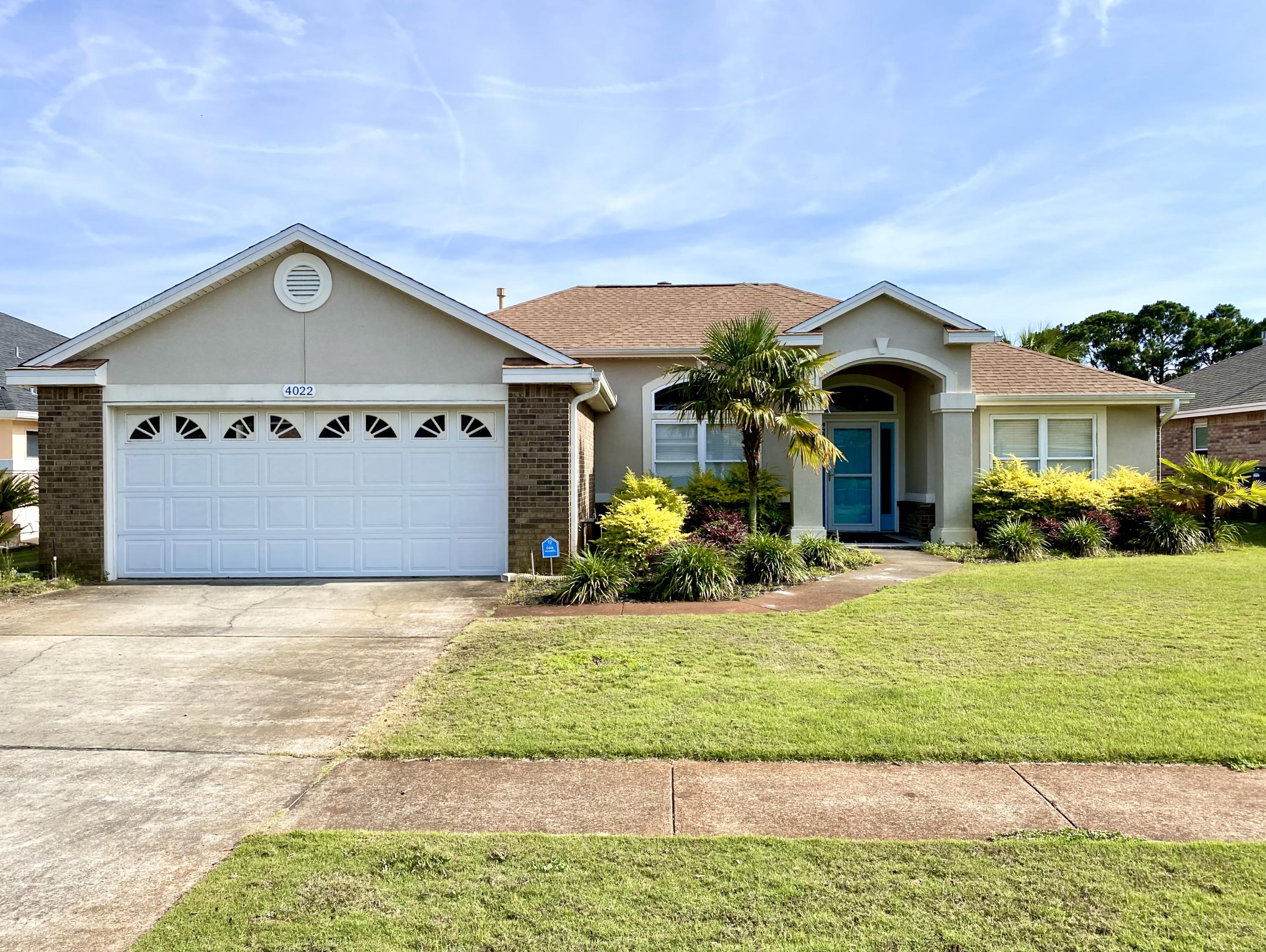 Newer Paint & Carpet! Beautiful brick & stucco split floor plan home is a short walk to the shopping, schools, restaurants and beach. Enjoy the natural light throughout the living area, kitchen, and dining area with 10 foot ceilings and tiled gas fire place. The kitchen has beautiful granite and slow close cabinets & stainless appliances. The master bedroom has ceiling crown, lighted accents, master bath has double granite vanity, jetted tub with separate shower and large walk-in closet. The two guest bedrooms with spacious closets and guest bath has wood look tiled floors and granite counter tops. Gorgeous view of the pond from covered & screened patio. Laundry room with front loading washer & dryer leads to the 2-car garage with attic storage. Rent includes monthly lawn care