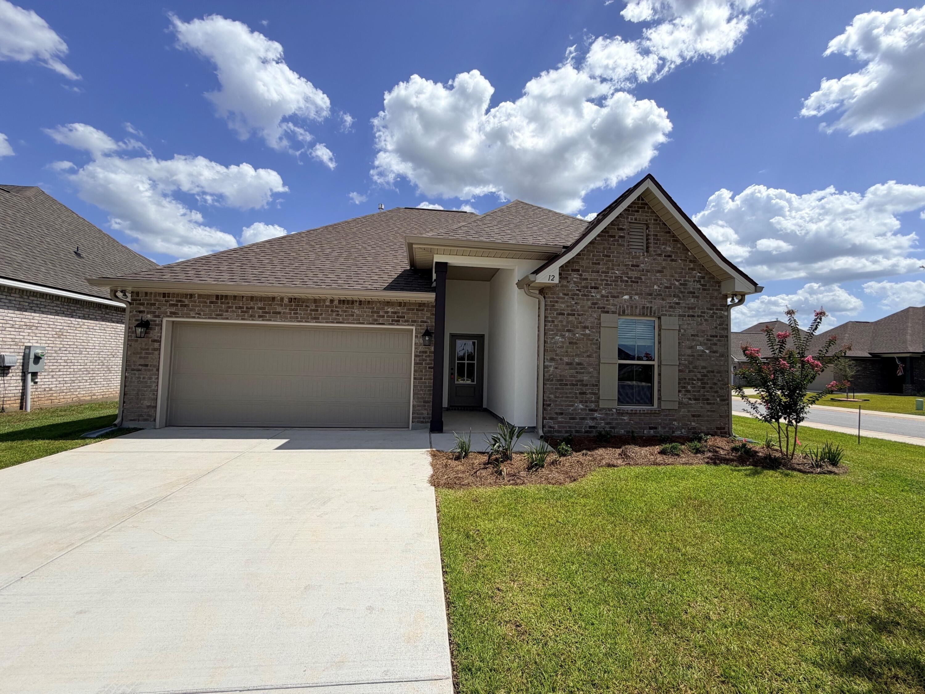 Located on a corner lot, the TRILLIUM IV B in The Bluffs at Lafayette community offers a 3BR/2BA, open and split design. Upgrades added (list attached). Special Features: double vanity, garden tub, separate shower, and walk-in closet (opens to laundry) in master bath, kitchen island, walk-in pantry, boot bench in mudroom, covered porches, undermount sinks, LED lighting, crown molding, ceiling fans in living and master, custom framed mirrors in all bathrooms, landscaping, architectural 30-year shingles, flood lights, and more! Energy Efficient Features: tankless gas water heater, gas kitchen appliance package, vinyl low E windows, and more! Energy Star Partner.