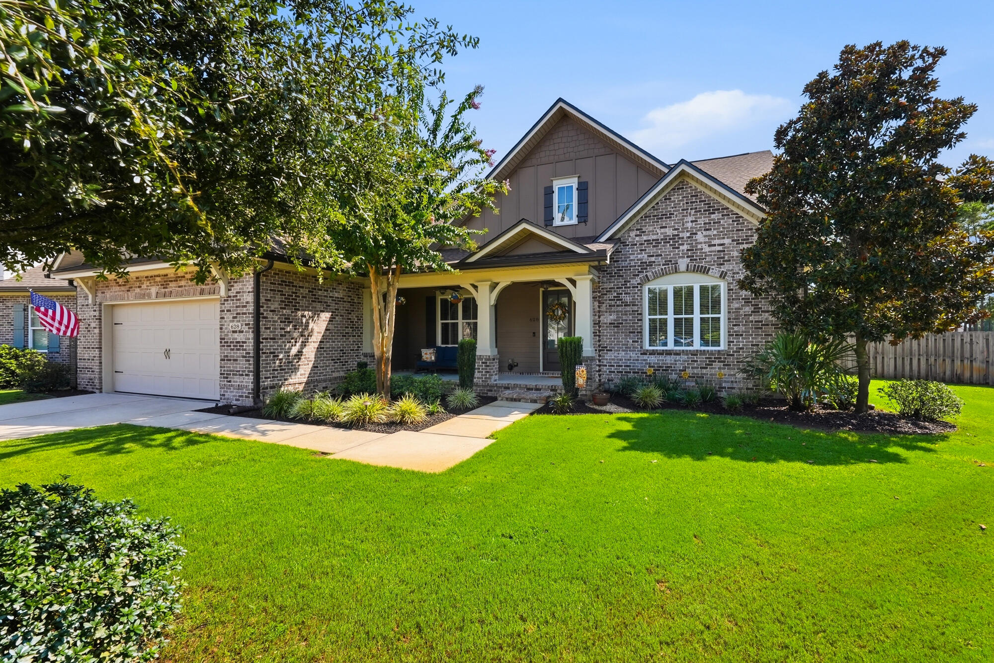 Welcome to 628 Meadow Lake Drive, an exceptional Randy Wise custom home in the prestigious Hammock Bay community where thoughtful design, timeless elegance, and superior craftsmanship come together. With approximately $35,000 in carefully selected upgrades and a brand-new roof installed in 2026, this impeccably maintained home is truly move-in ready.

Designed for effortless everyday living, the exclusive floor plan features a convenient continuous loop from the spacious primary suite through the custom-designed walk-in closet and directly into the laundry room. Closet organizers have been installed in every bedroom, providing exceptional storage throughout the home.

The gourmet kitchen is both beautiful and functional, featuring premium KitchenAid built-in microwave/oven combination and dishwasher, a striking ZLINE wood vent hood, Rev-A-Shelf pullouts including an appliance lift and pull-out trash storage, an upgraded pantry with custom wood shelving and cabinetry, and a stylish buffet and coffee bar that makes entertaining a breeze.

Designer finishes elevate every room, including elegant board and batten accents in the entryway, dining room, and primary suite, an inviting electric fireplace, and a beautifully updated primary bath complete with a custom vanity, cabinetry, and sparkling crystal light fixture. Step outside to your own private backyard retreat. The extended screened patio opens to an impressive outdoor living area featuring a stunning stone fireplace and a built-in pizza oven--perfect for entertaining family and friends year-round. The fully fenced backyard offers both privacy and space to relax or play.

Additional highlights include a RaceDeck garage flooring system, exceptional attention to detail throughout, and the unmistakable pride of ownership that makes this home stand apart.

Located in the award-winning Hammock Bay community, residents enjoy resort-style pools, fitness center, sports courts, miles of walking and biking trails, parks, playgrounds, and a vibrant calendar of community events, all just a short drive from the white-sand beaches of South Walton and the conveniences of Freeport.

This is a rare opportunity to own one of Hammock Bay's most distinctive custom homes, where luxury, functionality, and Florida living come together beautifully.