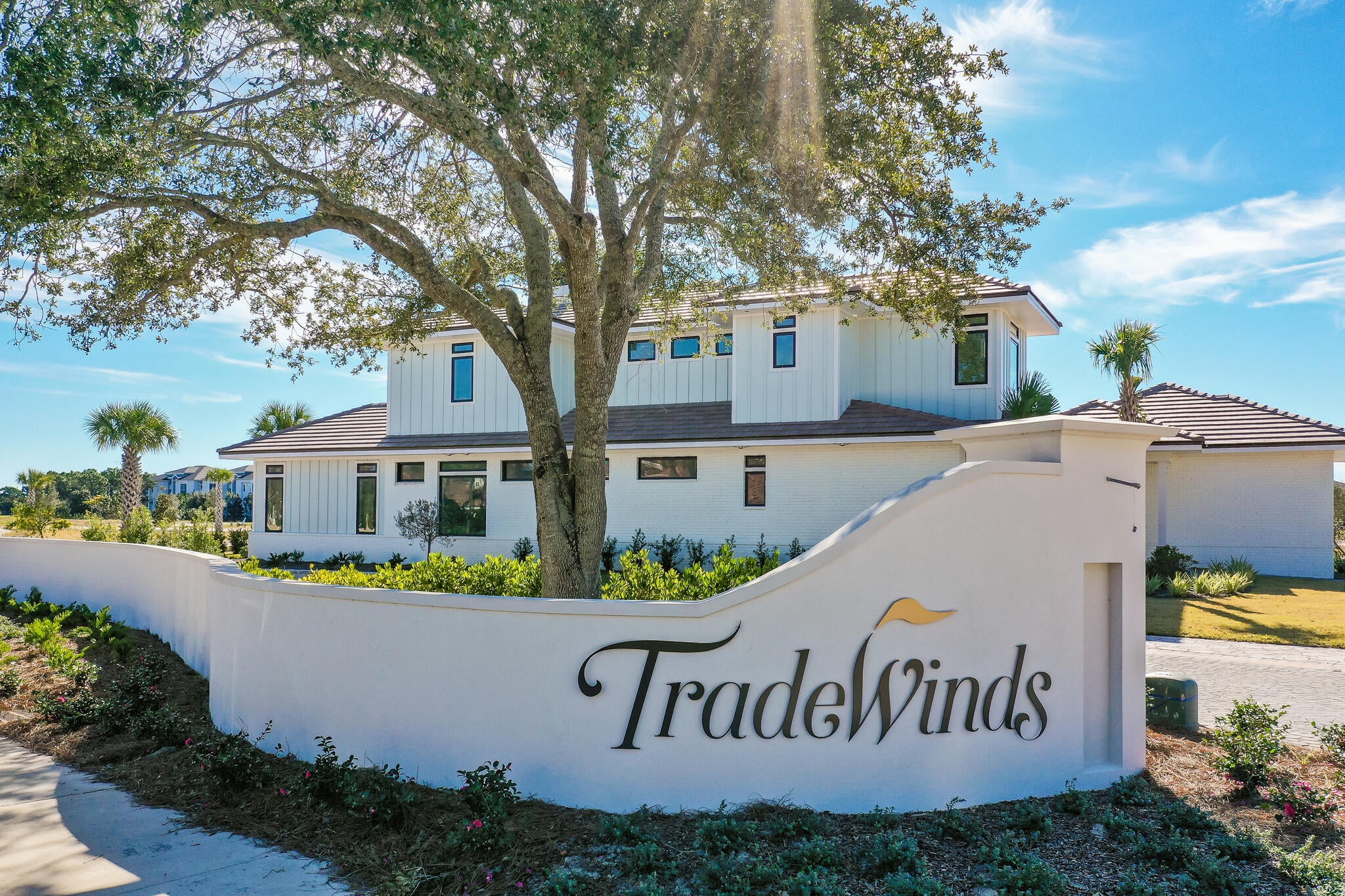 Less than a mile from the beach! Build your dream home in one of Destin's most desirable golf communities! This Premium LAKE AND GOLFCOURSE homesite (lot 3) is located in Regatta Bay's newest development, Tradewinds. Tradewinds consists of 54 homesites. Homes will be of a West Indies w/ Dutch influence style of architecture. Owner has the option to use an approved Architect & an approved Builder. Regatta Bay is a quiet, gated, golf & boating community that offers a LIFESTYLE unlike no other! The Regatta Bay Lifestyle is about convenience! You can golf cart to so many fun places in minutes, including the Beach! (See aerial photos) Within Regatta Bay, there is golf, swimming, tennis, pickle ball, park, playground, Regatta Bay Clubhouse, Legendary Marine & Legendary Yacht Club. Regatta Bay offers a private road that takes residents to the Destin Commons, where you'll find an array of popular men's and women's retail stores, luxury boutiques, a variety of restaurants, Whole Foods, Bass Pro, Lowes, AMC movie theater and Uncle Buck's Bowling! ALL ACCESSIBLE BY GOLF CART.