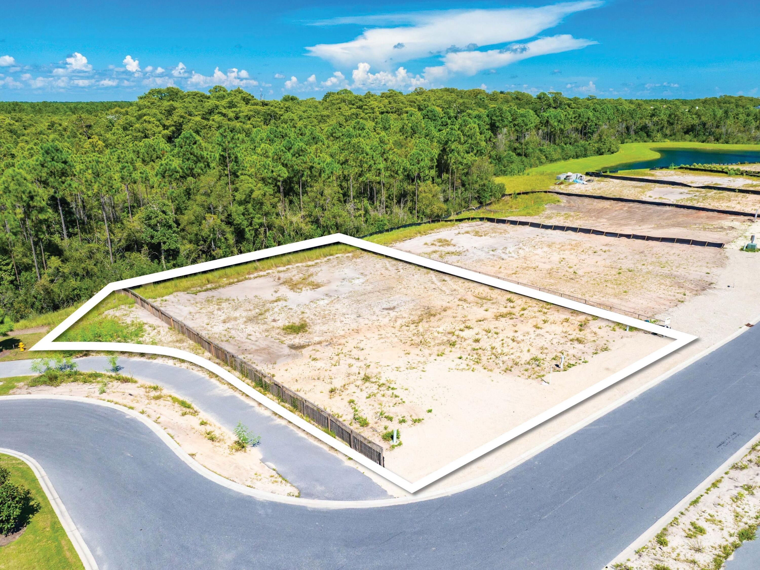 A unique opportunity presents itself to construct your custom home in the exclusive gated community of Watersound Camp Creek. This corner homesite is conveniently located at the end of a cul-de-sac and backs up to the woods with no house on one side, ensuring privacy from neighboring properties. Ownership in Watersound Camp Creek includes exclusive membership opportunities to the Watersound Club, featuring three championship golf courses, including the Tom Fazio-designed Camp Creek Golf Course and the acclaimed Davis Love III-designed The Third. Members also enjoy complimentary beach chair and umbrella service at the Gulf-front Beach Club, an expansive 11,000-square-foot wellness center, resort-style pools, exceptional tennis and pickleball facilities, and an impressive collection of private dining venues and exclusive club amenities. Don't miss this special offering!