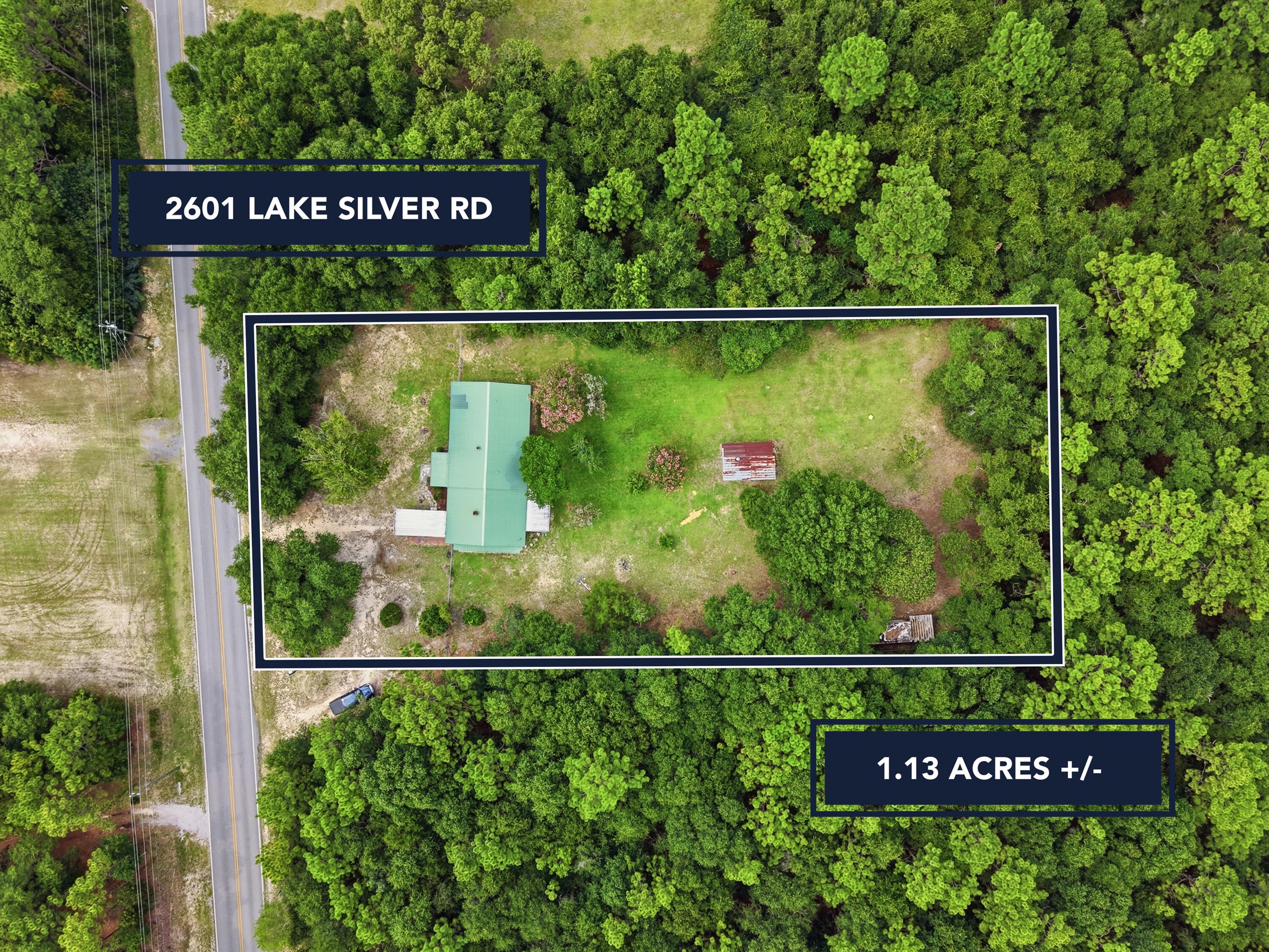 RARE LAKE SILVER OPPORTUNITY! Own a home on Lake Silver with approximately 1.2 acres at an exceptional price point! Whether you're looking for an investment property, or a place to make your own, this property offers tremendous potential. Previously rented for $1,700/month, it presents an attractive investment opportunity or the perfect canvas for thoughtful updates and a little TLC.
Enjoy a fully fenced backyard surrounded by mature trees and established landscaping, creating a peaceful and private setting. Located in the county, this property also offers the benefit of lower property taxes. Major systems,2018 HVAC system, 2015 water heater, and metal roof.
The converted garage adds valuable additional living space and features a cozy wood-burning stove--perfect for a family room, or flex space. With a large lot, privacy, and plenty of potential, opportunities like this don't come along often. Bring your vision and unlock the possibilities!