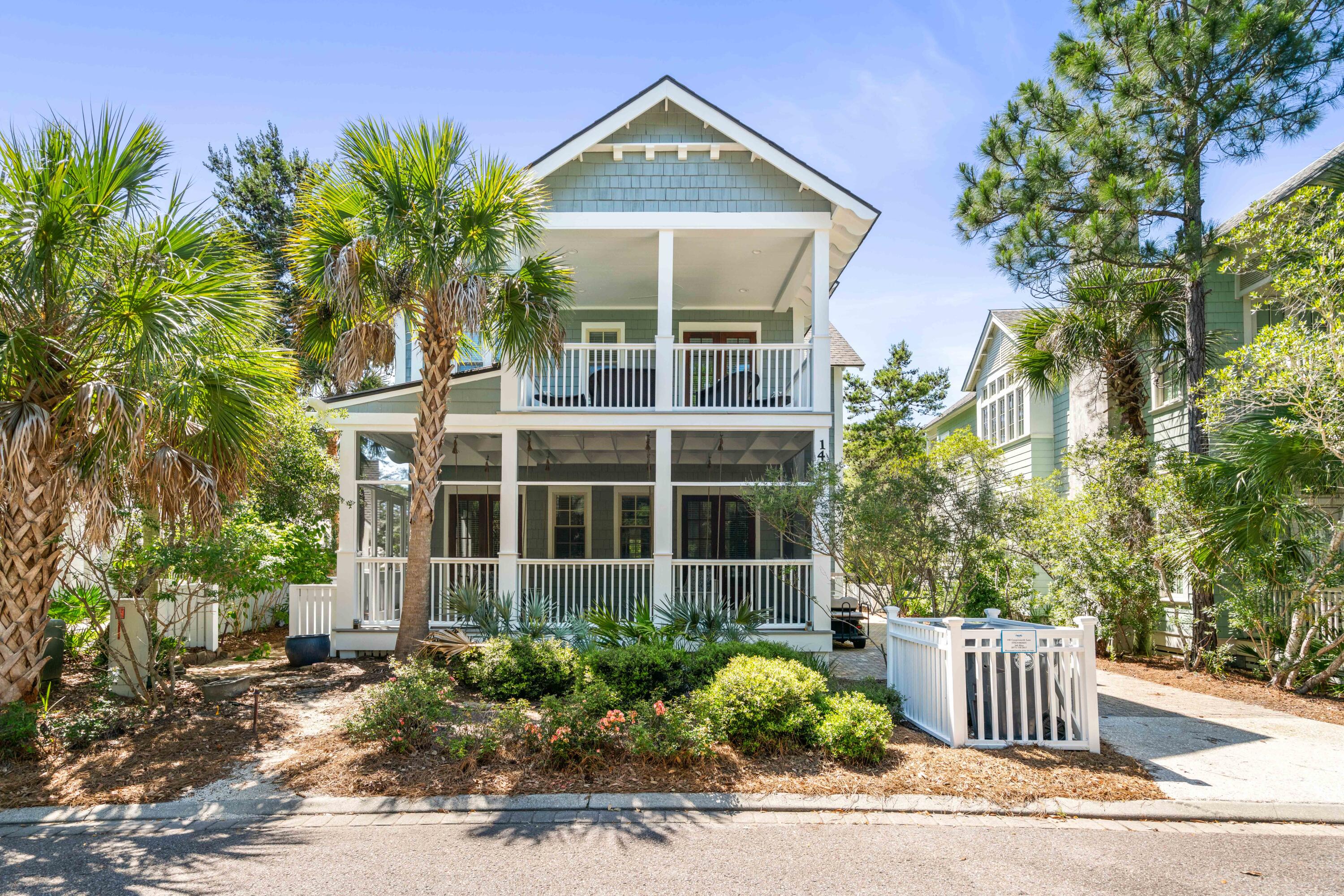 Positioned along one of WaterSound Beach's most desirable streets, this Gulf View beach home by Harrison Design is a fully furnished coastal retreat where privacy, scale, and unforgettable 30A living come together. Backing directly to the protected landscape of Deer Lake State Park, this 5-bedroom, 5-bath residence offers a rare sense of seclusion within one of the Gulf Coast's most treasured gated beach communities.

Designed across four thoughtfully planned levels, the home captures the ease of beach living with generous gathering spaces, multiple outdoor porches, Gulf and preserve views, and a layout made for hosting. A gracious front porch with swinging daybeds sets the tone, while the interiors balance relaxed coastal elegance with comfort and functionality. The first level features three private bedroom suites, including a primary suite with a clawfoot tub and porch access overlooking the pool and natural backdrop beyond.

At the heart of the property is an exceptional private outdoor oasis: a heated saltwater pool surrounded by lush landscaping, lounge space, and a grilling area ideal for effortless afternoons and evenings at home. Upstairs on the 2nd floor, the main living level opens to a spacious great room, dining area, and chef's kitchen with premium appliances, dual commercial-sized refrigerator and freezer, a large breakfast bar, and seamless access to multiple balconies and outdoor dining areas. A second primary suite on the main living level offers additional comfort and privacy, while an adjoining guest room creates flexible accommodations for owners and guests. The third-floor loft provides a generous secondary living space with room for media, games, and overflow sleeping, and the fourth-floor lookout tower is the home's crowning feature--an elevated perch for taking in Gulf views, coastal dune scenery, sunrise coffee, and sunset cocktails.

Life in WaterSound Beach is defined by quiet luxury, timeless architecture, winding boardwalks, preserved dunes, and private beach access to one of 30A's most beautiful stretches of sugar-white sand. From beach days and bike rides to WaterSound Beach Club amenities, community pools, nearby dining, shopping, and entertainment, this home places the best of the 30A lifestyle within easy reach while offering a peaceful retreat at day's end.

With its coveted location beside Deer Lake State Park, expansive private pool, Gulf-view tower, multiple porches, furnished interiors, and strong rental appeal, 148 Coopersmith Lane is a standout opportunity in WaterSound Beach. Inquire for more information and to schedule a private showing today!