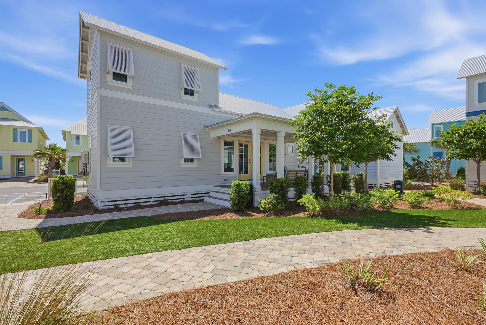 Welcome to ''Surf Bungalow 25,'' your private slice of paradise at the premier Margaritaville Beach Cottage Resort on Front Beach Road--one of the most sought-after Gulf-front communities in Panama City Beach. This posh 1-bedroom + mezzanine cottage showcases the highly desirable ''Surf's Up'' floor plan, offering 816 square feet--the largest of the Surf Bungalow layouts. With only 14 of 42 bungalows built in this configuration--and this being the only one currently available--this property presents a rare opportunity for both ownership and investment. Thoughtfully designed for comfort and functionality, this home features a main-level primary suite with a king bed and private ensuite bath, along with a spacious mezzanine offering full-over-full built-in bunk beds and its own private bath. The open-concept layout includes a well-appointed kitchen, dining area, and inviting living space, all professionally furnished and completely turnkey. Enjoy outdoor living on the spacious front porch, surrounded by lush tropical landscaping for added privacy. Positioned in one of the most desirable spots in the community, Surf Bungalow 25 is among the closest units to the clubhouse and pool--enhancing both convenience and rental appeal. Resort-style amenities elevate the experience, including nearly 600 feet of private beach access, a zero-entry resort pool, two waterslides, a lazy river, and exclusive access to the resort clubhouse featuring a fitness center, arcade, activity center, conference space, and the popular License to Chill Bar & Restaurant. With strong rental potential and bookings already secured for 2026, ''Surf Bungalow 25'' is a true turnkey investment offering both income potential and an exceptional coastal lifestyle. Don't miss this rare opportunity to own one of the most desirable properties in Panama City Beach.