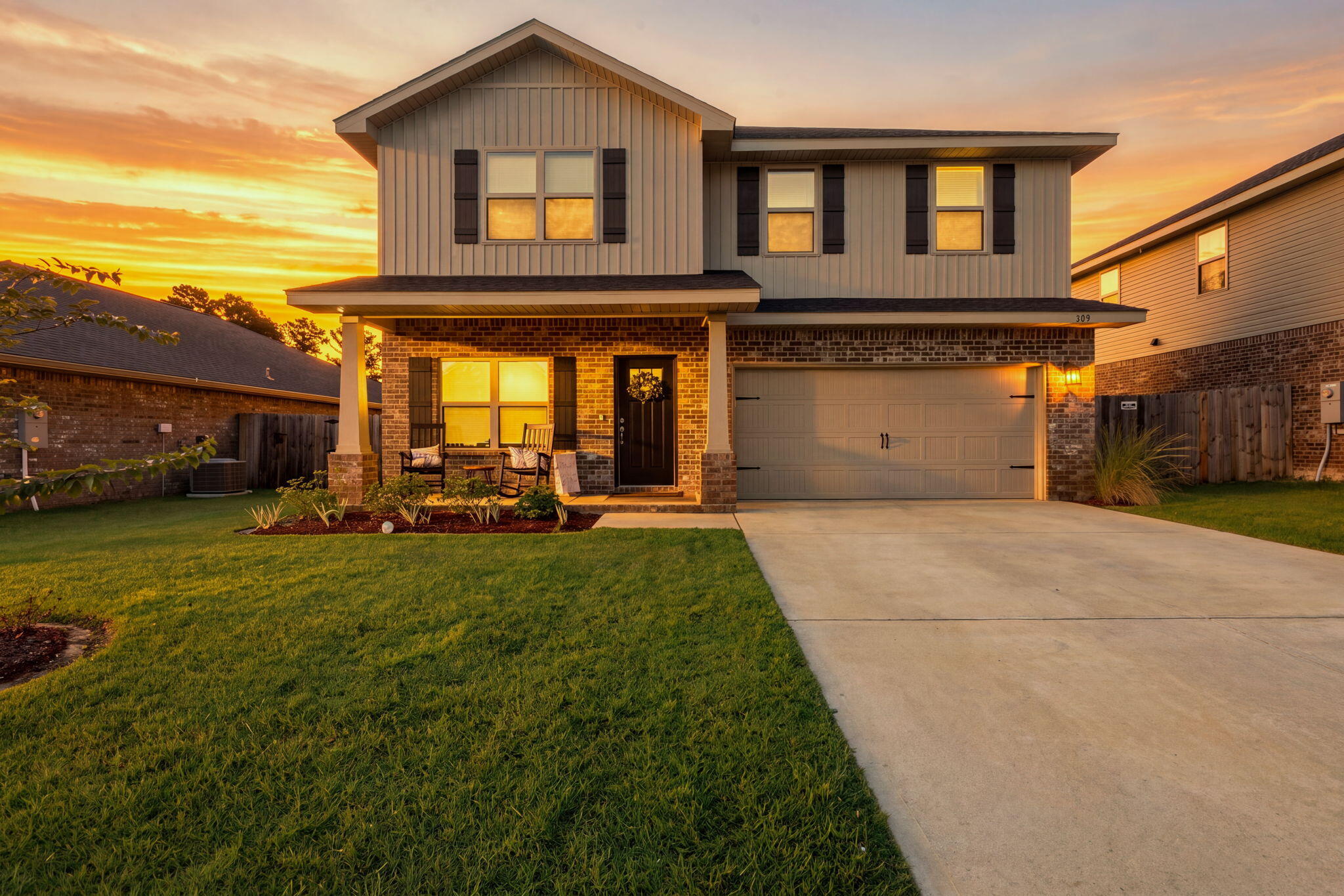 WOW! This super spacious 3270 square foot like new home in North Crestview is worth a look.
You need space...this one is delivers!
Six bedrooms and Three and a half bathrooms. Plus a large bonus room. The master suite is on the 1st floor along with the living room, dining room and kitchen. The powder room is tucked under the stairway and is very cool. Large closets in the bedrooms and space abounds in this home.
Peaceful front porch is a great spot for comfortable chairs and morning coffee. And there is a large rear patio with a fully fenced yard. Nice landscaping, and the irrigation system keeps it looking great. There is a two car garage and large drive way for parking and storage. Four sided brick with board and batten vinyl siding on the 2nd level. Attractive and low maintenance.
Coretec Pro-Plus flooring in the living and bathroom areas with carpet in the bedrooms. The kitchen has granite countertops, an island, and stainless appliances. Master bathroom has a large garden tub and separate shower.
Ridgeway Landing is within close proximity to shopping, schools, restaurants and more. It offers streetlights, sidewalks, underground utilities and a community pool. 
This is a wonderful home in a very nice community, and in a great location. You will love living here!