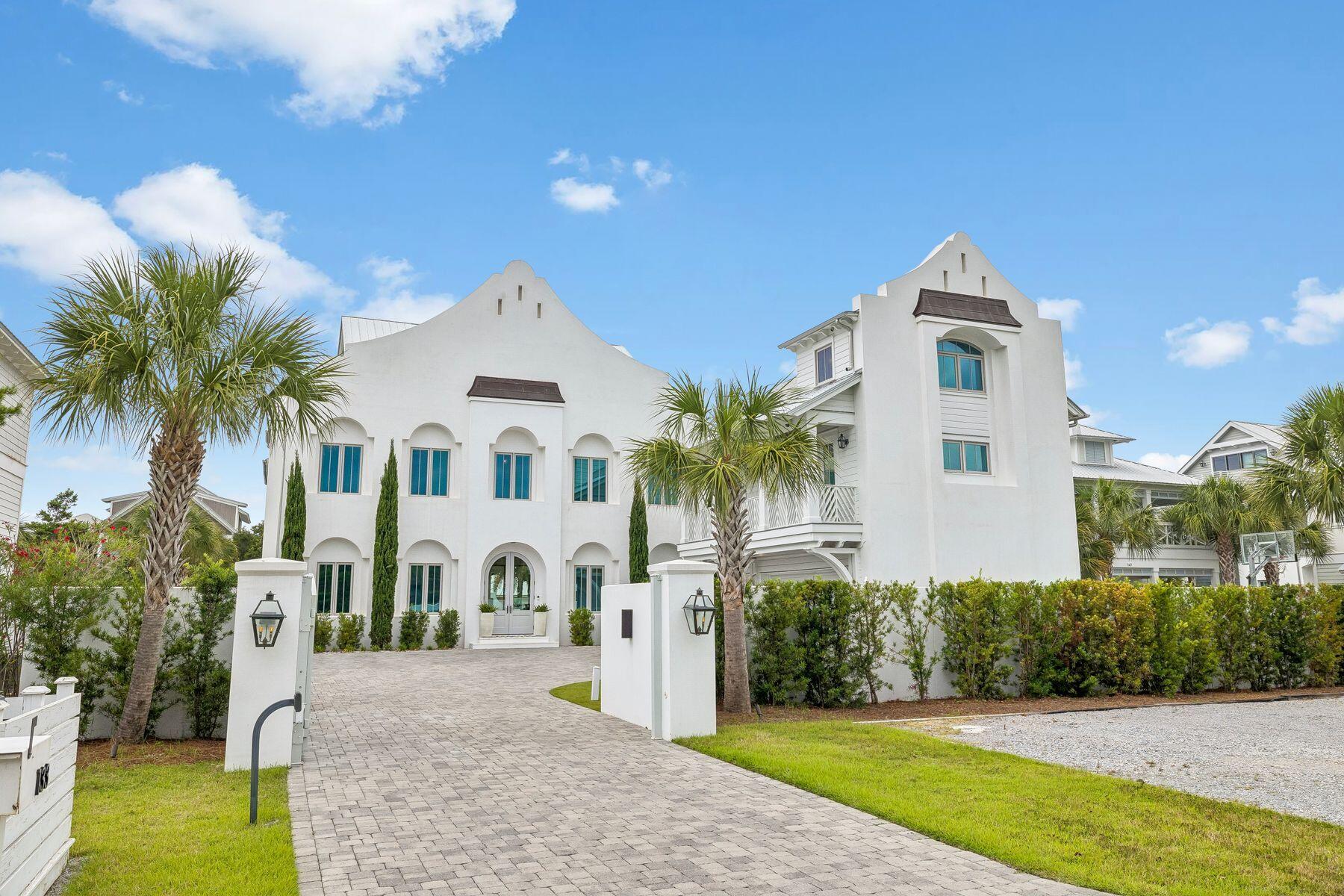 Tucked away on a private street with no HOA, this exceptional coastal estate offers a rare combination of privacy, luxury, and unmatched entertaining potential. Situated on an oversized 0.30-acre lot, the property features abundant parking with additional overflow spaces, making it uniquely suited for hosting family gatherings, special events, and large celebrations. The home has successfully hosted weddings and events of more than 150 guests, a testament to its thoughtful design and expansive indoor and outdoor living areas.
A private gated entry welcomes you into a residence crafted for both comfortable everyday living and memorable entertaining. Inside, you'll find two primary suites conveniently located on the first floor, along with several additional living spaces that provide exceptional flexibility. Whether working from home, pursuing wellness goals, or accommodating guests, the dedicated office, gym area, and oversized third-floor den offer room for every lifestyle.
High-end finishes and quality craftsmanship are showcased throughout, including concrete construction, Venetian plaster walls, hardwood flooring, and premium appliances. Gulf views enhance the coastal atmosphere, while the private pool creates a resort-style setting perfect for relaxing or entertaining.
Adding even more versatility, the property includes a separate carriage house complete with a full kitchen and two bedrooms, providing ideal accommodations for guests extended family, or potential rental opportunities.

Located just a short walk from private deeded beach access, this extraordinary property presents a rare opportunity to own a home that seamlessly blends luxury, functionality, and investment potential. Whether you're searching for a full-time residence, a second home, or a premier coastal retreat capable of hosting unforgettable gatherings, this property truly has it all.
