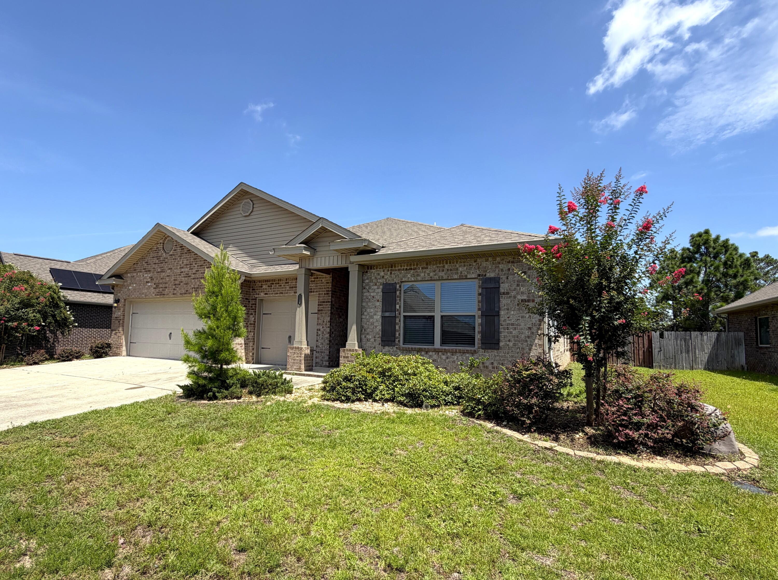 Welcome to the desirable Redstone Commons community. This home will greet you with a wide-open floor plan, 4 bedrooms, 3.5 bathrooms, and a 3-car front entry garage.  The 4th bedroom has an added living space and its own bathroom possibly making it great for an older child or live-in parents.  The covered back porch leads to a stunning pool and deck for you to relax and entertain! The subdivision includes a playground, clubhouse, and dog park and it's located directly across from Riverside Elementary and Shoal River Middle School. I-10, beautiful Emerald Coast beaches & Eglin AFB are only a short drive away.
